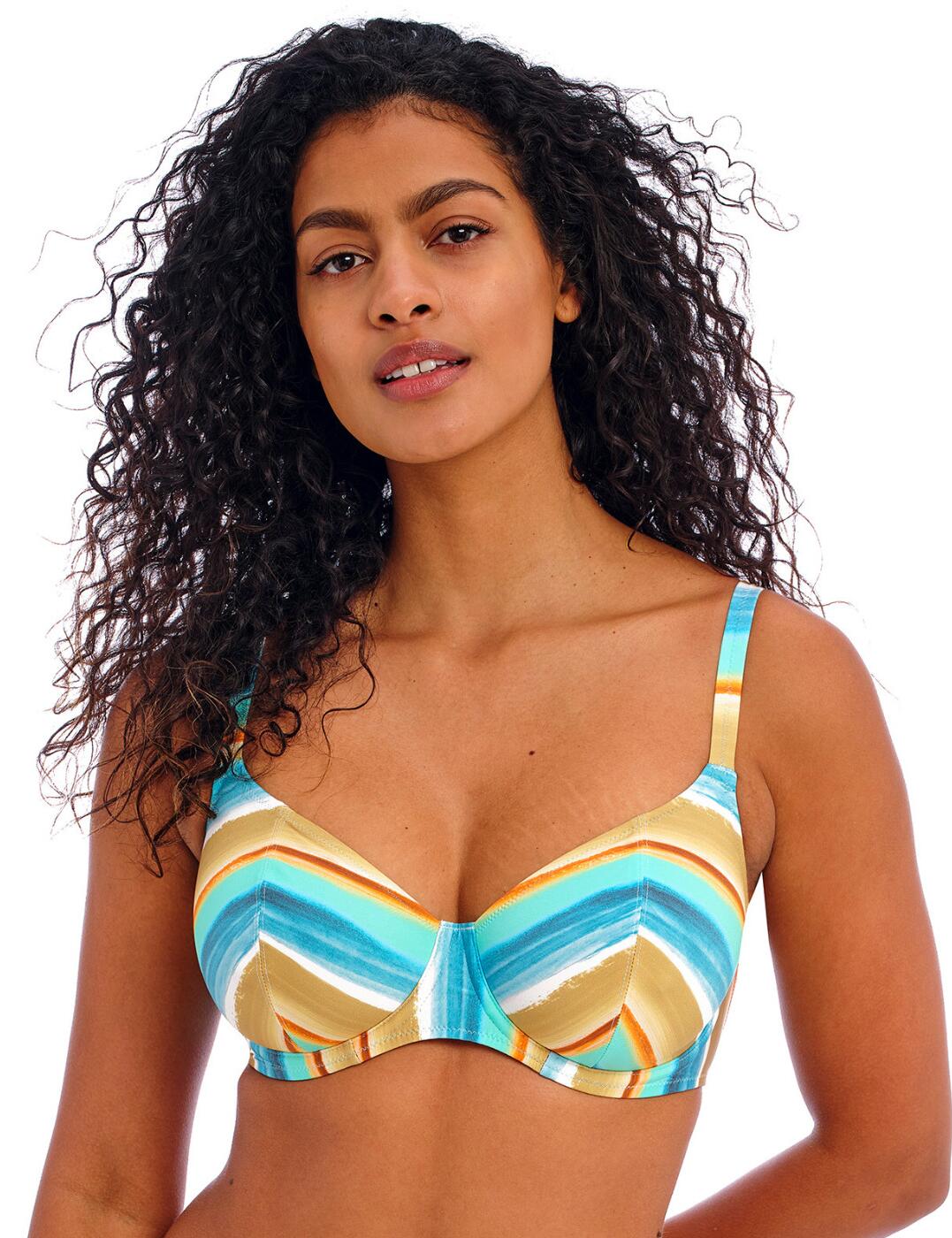 Don't sleep on this dreamy underwired plunge bikini top from the Castaway Island collection by Freya. This stunning bikini top has lined cups for smoothing shape and support whilst the super flattering is plunging for less coverage. Perfect for those laid back holidays, his dreamy print belongs on the golden sands with you. Fully supported with adjustable soft shoulder straps and clip fastening. Matching coordinates are available.  Gorgeous bikini top Cheeky low plunging neckline Underwired for a supportive fit Lined smooth cups for shape Clip fastening Fully adjustable shoulder straps Matching swimwear available Country of origin: Tunisia Composition:86% Polyamide &pipe; 14% Elastane Listed in UK sizes  62652-108057-1432868 205702 Plunge Bikini Top
