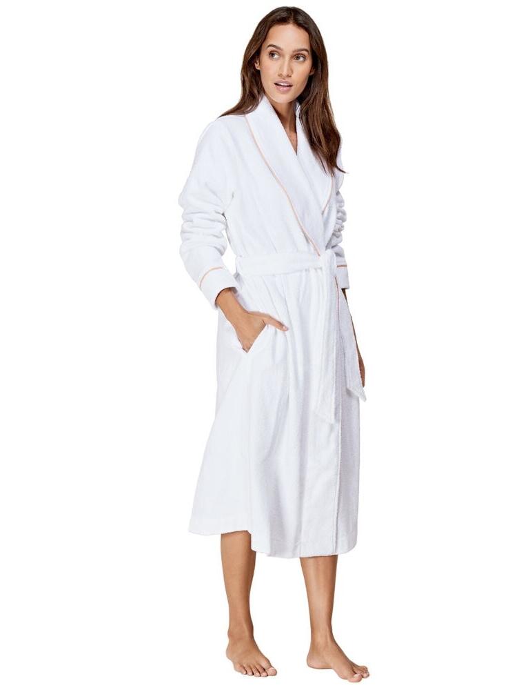 Invest in some you time with this comfy bathrobe from Triumph. Made for relaxation, this robe is crafted from a thick, soft material which feels great against the skin. Ideal for the cosy months, this robe is sure to be your 'go-to' for Autumn and Winter. The robe has a subtle contrast trim and a practical belt at the waist.  Soft and comfy Thick material Contrast trim Tie waist belt Composition:- 100% Cotton Listed in UK sizes  47014-86018 10186898  Robe