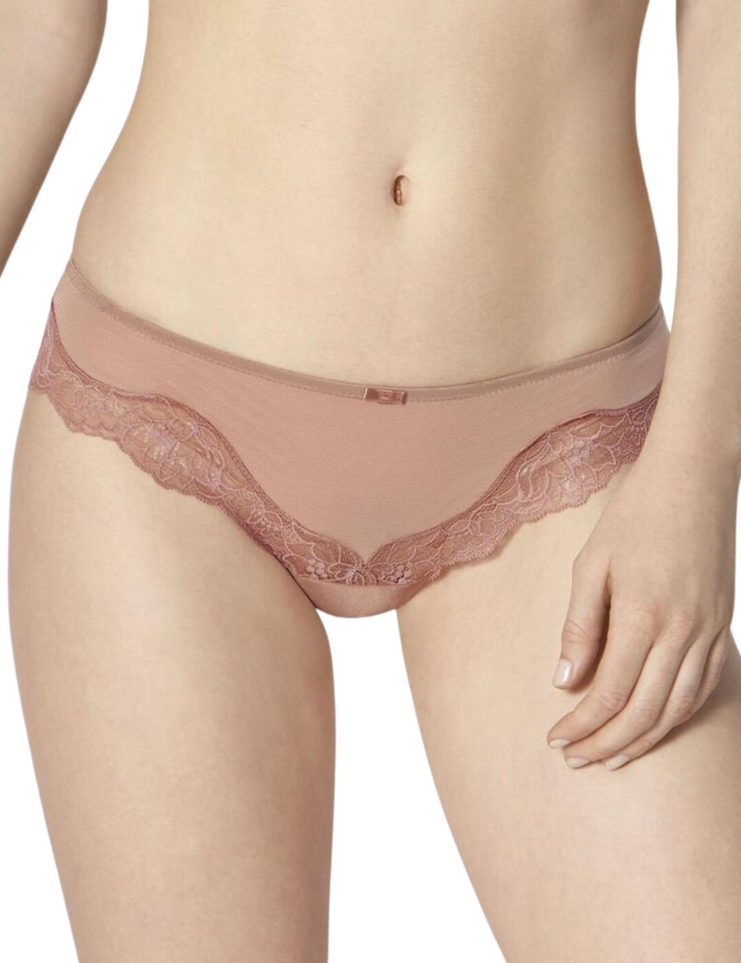 The timeless Amourette Charm collection by Triumph will add a flirty fresh look to your everyday lingerie collection. This classic brief has a cheeky Brazilian shape that combines moderate rear coverage with a scalloped lace trim to highlight you beautiful curves. The low-rise waist and soft semi-sheer fabric add to the flirtatious look.