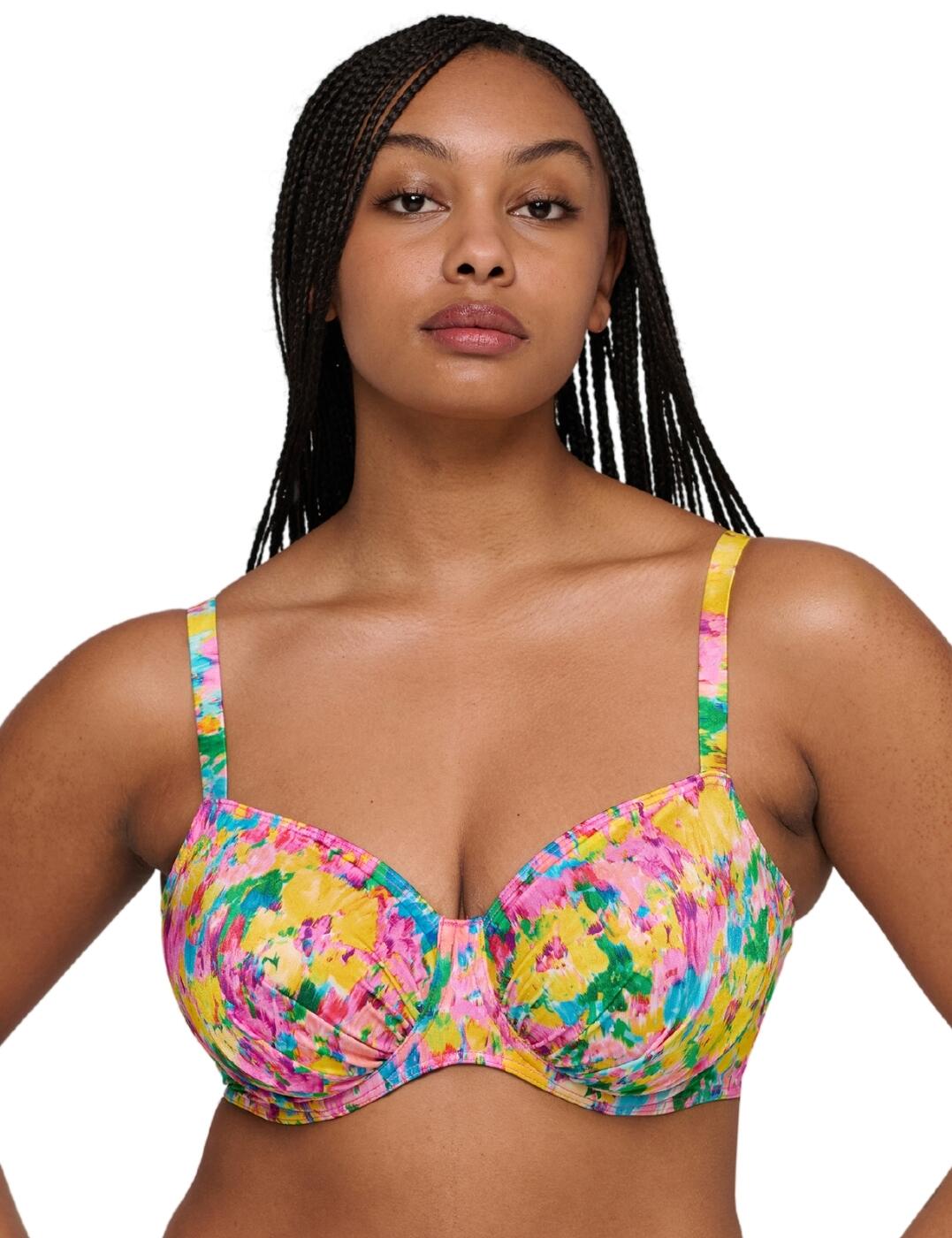 This full cup bikini top by Prima Donna's Ubud collection is a staple in your luxury swimwear collection! It features a vibrant all-over print for a playful touch whilst the supportive underwiring and adjustable straps ensure comfort. Flattering gathered fabric detail and non-padded full cups to highlight your natural silhouette while enhancing your cleavage, feel fabulous on your next swim in this stunning bikini top. A plastic back clasp fastening creates a secure feel. To complete this look pair it with our matching briefs to elevate this look even more!
