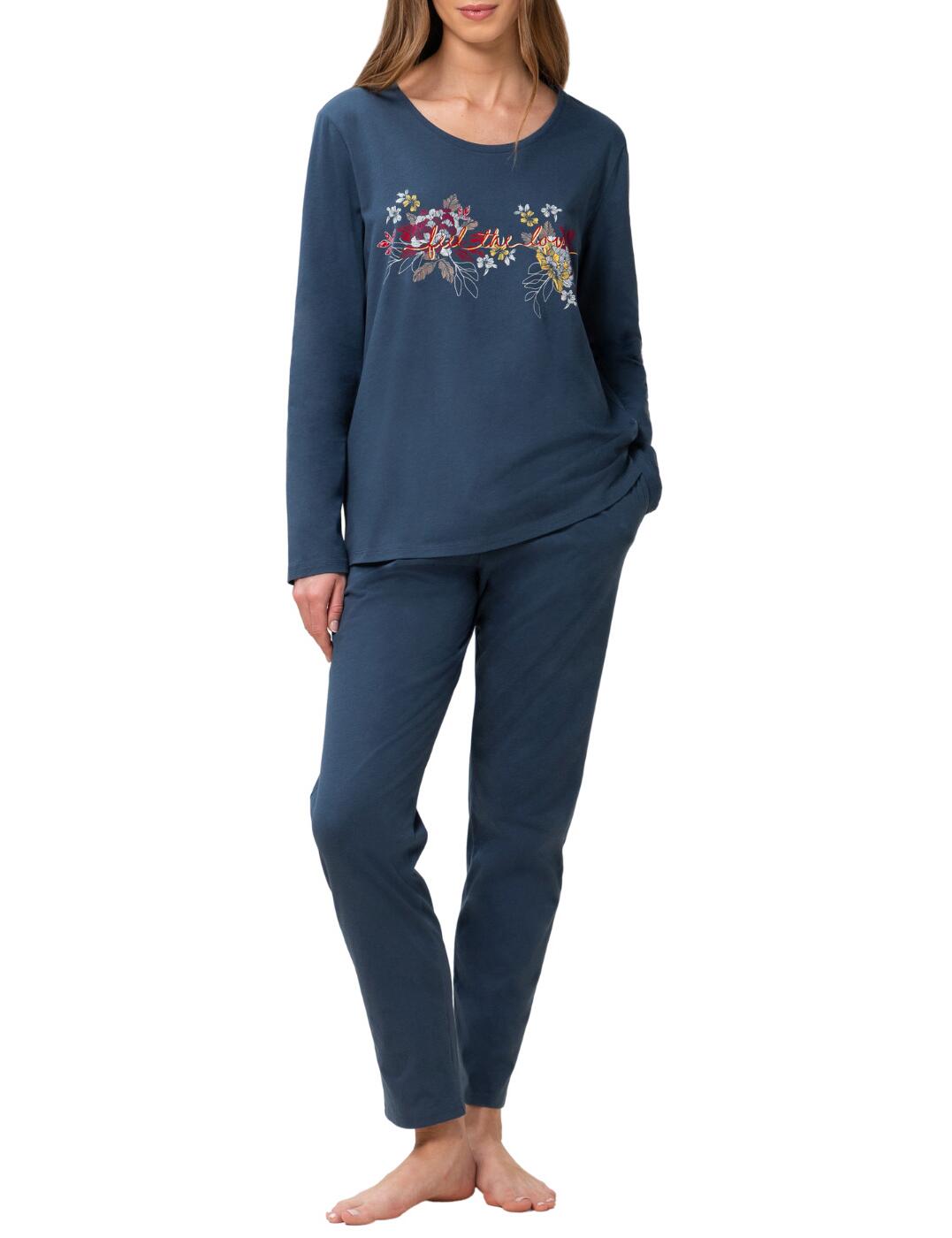 This simple and comfy pyjama set comes to you from Triumph. The long sleeved top has an embroidered floral pattern on the front of the shirt, which beautifully contrasts the colour of the shirt itself. A scoop neck is styled making this piece modest, easy to put on, and perfect for sleeping or lounging in. The elasticated waist trousers allow flawless comfort and movability, but are not cuffed at the bottom making them perfect for summer wear or winter wear.  Scooping neckline Embroidered floral design Elasticated waistband Two-piece Long sleeved Country of Origin: Vietnam Composition: 100% Cotton Listed in UK sizes  56167-99745 10209568 Pyjamas