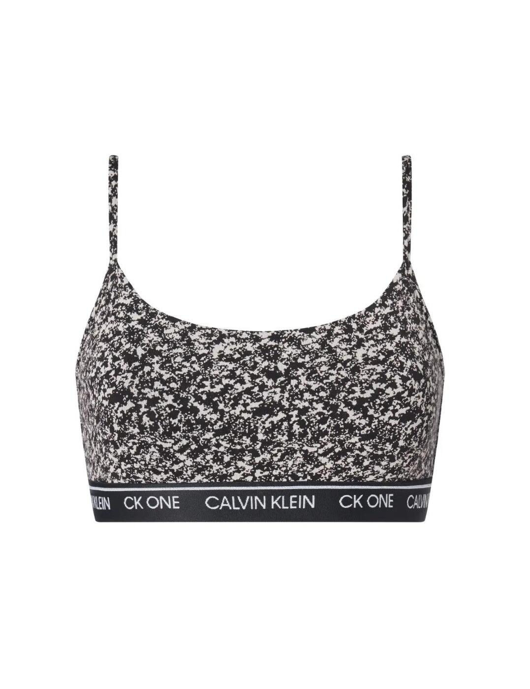 Calvin Klein's CK One Cotton range brings a quirky playfulness to a timeless string bralette design. Featuring an on-trend animal print with nude background tones and an open back design. Perfect for days when you don't want to wear a proper bra or as an undergarment to a low cut/plunge back top.  Cotton-modal blend Unlined, no padding Adjustable shoulder straps Open back design, pulls on Calvin Klein signature elastic underband Care instructions: Machine wash. Do not tumble dry Composition: 55% cotton 37% modal 8% elastane Listed in UK sizes  47323-86414-1150065 QF5727E Bralette Bra