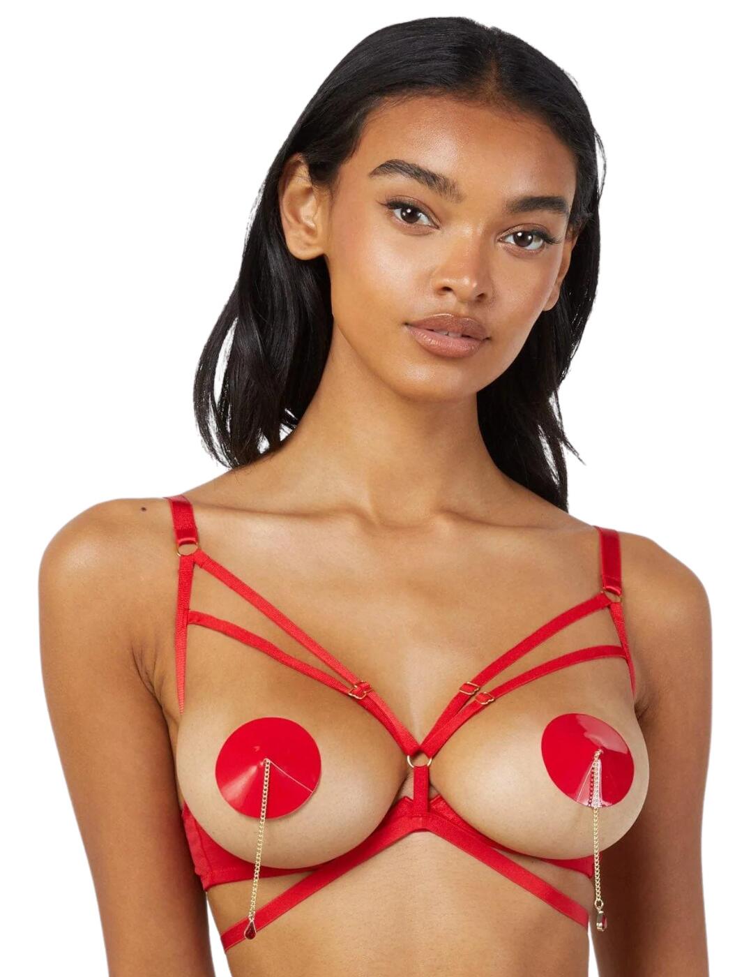 Wolf & Whistle's Sarah open-cup bra is sensual and chic, with an invigorating strappy design that leaves nothing to the imagination. The straps are adjustable over the arms and across the upper cups to ensure you can get the perfect individual fit and the rear hook and eye fastening is simple and secure for easy wear. There is an underwire to provide shape to your chest that is flawlessly embraced with the open-cup style.  Open cups Strappy design Underwired Adjustable straps Hook and eye fastening Country of origin: China Composition: Main: 81% Polyamide &pipe; 19% Elastane Composition: Lining: 100% Polyamide Listed in UK sizes  58891-103438-1358879 WWL990R Open Cup Bra