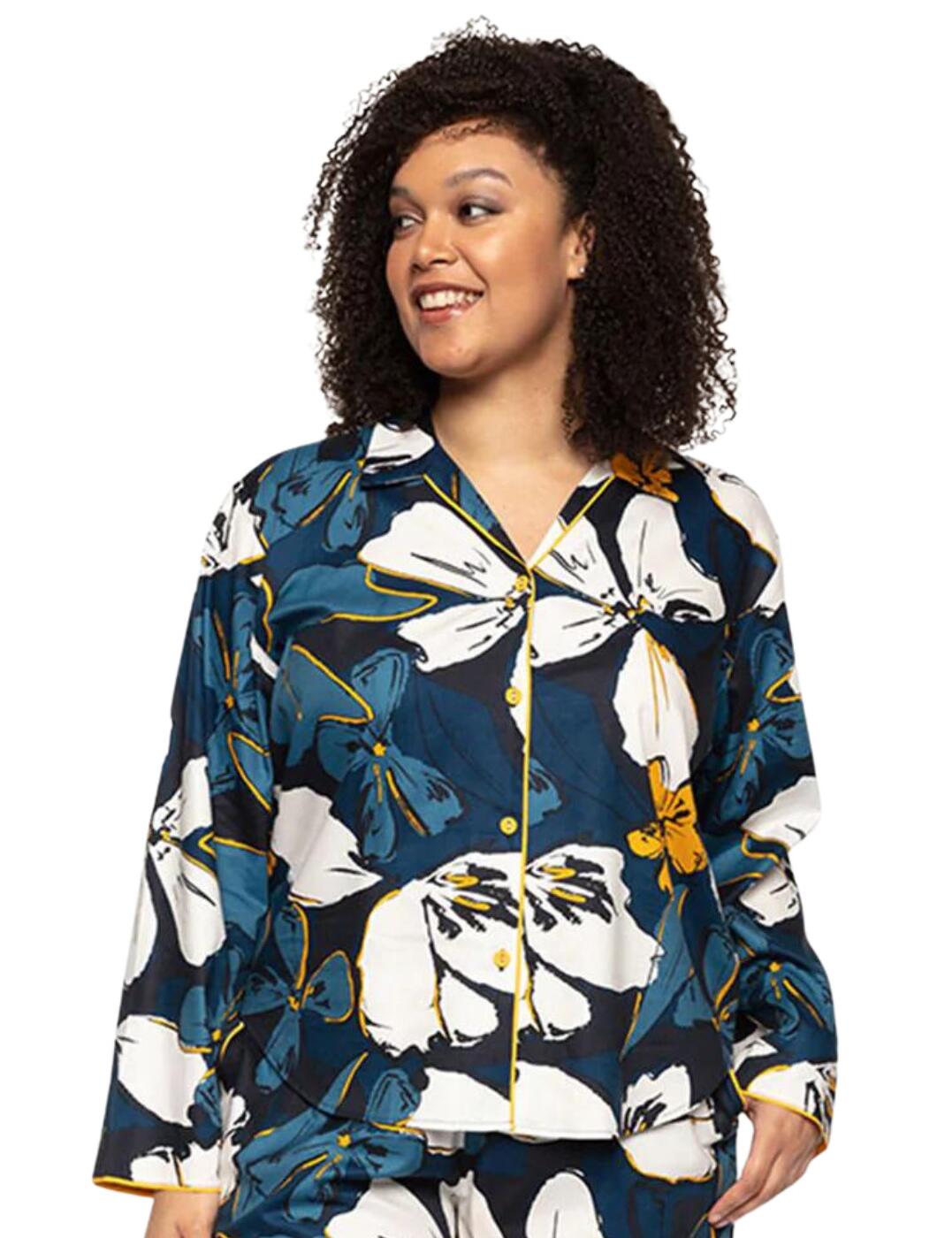 The Verity range by Cyberjammies brings classic must-have pyjama pieces with a gorgeous all-over floral print. This pyjama top has a sophisticated style with a collar, long sleeves, a button-up front and a loose-fitted design. It has a modern look with an all-over floral print with pops of colour and piping detailing throughout. Matching items are also available for a fully coordinated look.  Pyjama top Sophisticated collar Button-up front Long sleeves All-over floral print with piping Matching items are available Country of origin: India Composition: 60% Cotton &pipe; 40% Modal Listed in UK sizes  56862-100660-1307481 9352  Pyjama Top