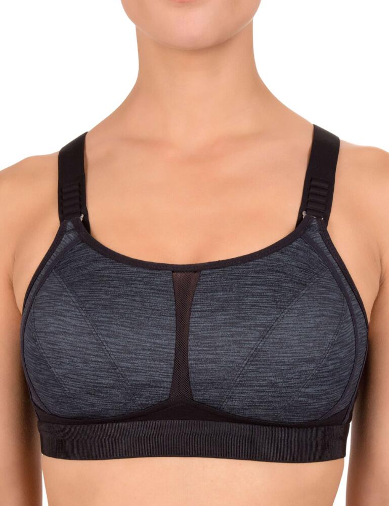 When you're working out you need all the support you can get, which is why the new sports bra from the Power Move Basics range by Felina is a must-have! The non-wired and soft padded cups with side stiffening elements maintain the optimal shape of the bust. This sports bra also features mesh inserts that maintain a normal climate for the body. Besides the adjustable straps and hook and eye closure at the back this bra also has an additional clasp at the neck, giving you ultimate control so you're sure to find your perfect fit.  Classic and feminine style High performance with full coverage Foam cups for smooth breathable shaping Mesh panels for cool comfort Non-wired cups Shapes and supports the bust Basic three-row hook and eye closure Composition: 82% Polyamide &pipe; 10% Elastane &pipe; 8% Polyester Listed in UK sizes  47396-86475-1149931 803820 Sports Bra