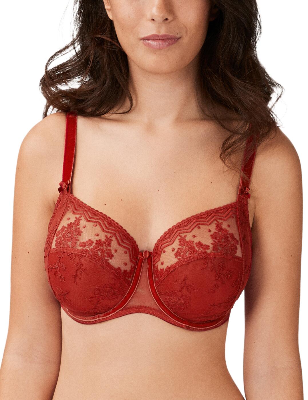 Update your luxury lingerie collection with the Ellen range by Empreinte, which introduces this full-cup bra. It provides full coverage with a supportive underwire, making it super flattering on the bust. The bra ensures a comfortable fit with a hook and eye closure and velvet adjustable straps. It has romantic floral embroidery across the cups with an opaque bottom section and a sheer upper section. The back band is made of an opaque fabric that allows for a smooth look. Made complete with mini bows at the beginning of each strap and a button charm in the middle.  Full cup bra Supportive underwire Hook and eye closure and adjustable straps Romantic floral embroidery detailing and velvet straps Opaque plain back band for a smooth fit Mini bows and button charm Country of origin: Morocco Composition: 51% Polyamide &pipe; 33% Polyester &pipe; 16% Elasthane Listed in UK sizes  56940-100751-1306546 07211  Full Cup Bra