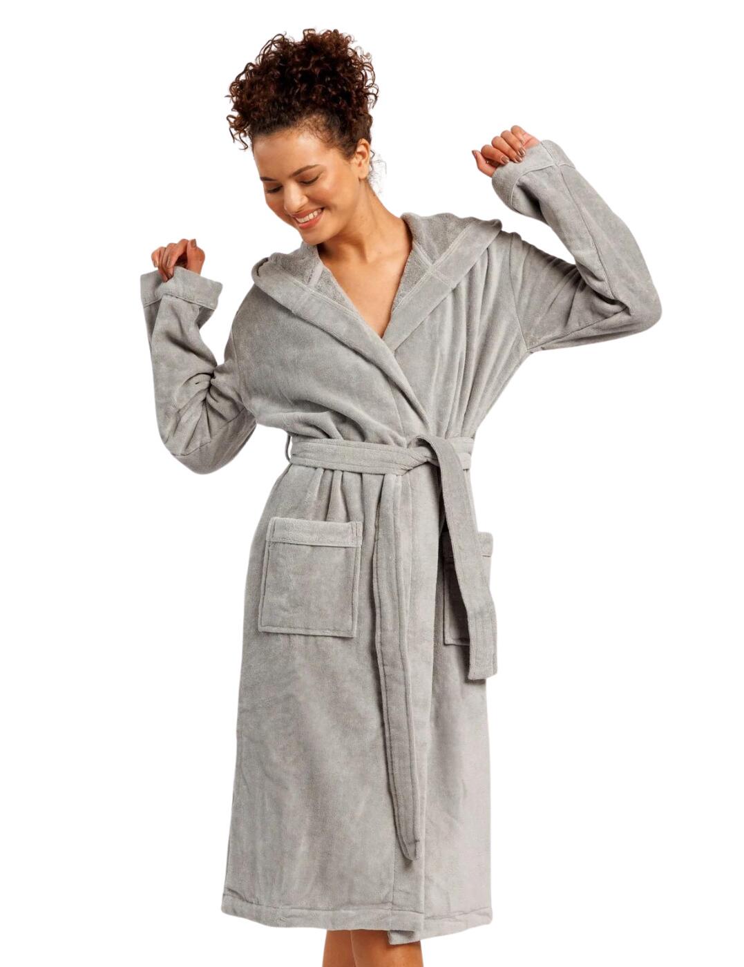 This luxurious dressing gown from Chelsea Peers is perfect for a relaxed day at home, with super soft towelling cotton that will keep you warm without getting sweaty. The self-tie belt allows you to customise the fit by cinching the waist for a tight, snug fit or leaving it open for a freeing feeling. The long sleeves and below-knee length provide you with full coverage for those cold mornings and the large hood allows you to stay cosy no matter what. Large front pockets are perfect for carrying your phone or your snacks wherever you are.  Soft towelling fabric Waist tie Long sleeves Below-knee length Front pockets Large hood Country of origin: Bangladesh Composition: 100% Cotton Listed in UK sizes  58848-103374-1354627 CPNY-23-654 Dressing Gown