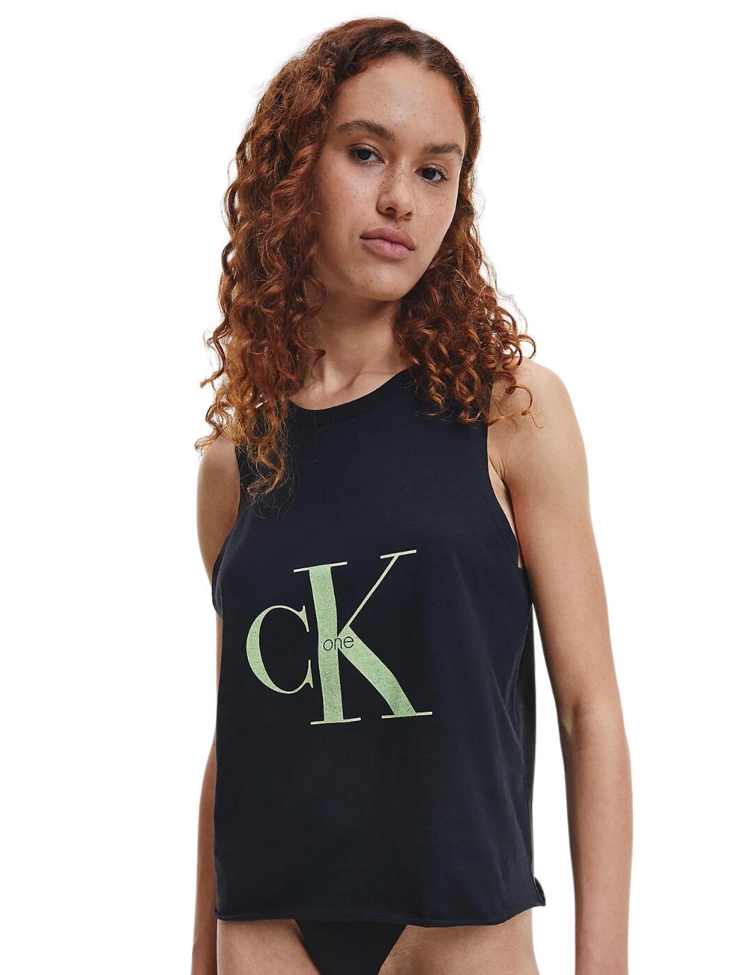 Add a fresh new casual cool look to your loungewear collection with Calvin Klein's recognisable CK One Cotton collection. This pyjama top is crafted from soft and breathable cotton that is perfect for sleeping or lounging. The minimal sleeveless and crew neckline design is enhanced with a bold CK One logo, creating a chic designer look. For a stylish athleisure look, wear with matching coordinates from the iconic CK One Cotton collection by Calvin Klein.  Casual sleeveless design Contrasting CK One logo Crew neckline Loose fit Pull-on design Matching coordinates available Country of origin: Sri Lanka Composition: 100% Cotton Listed in UK sizes  56992-100827-1307574 000QS6884E  Pyjama Top