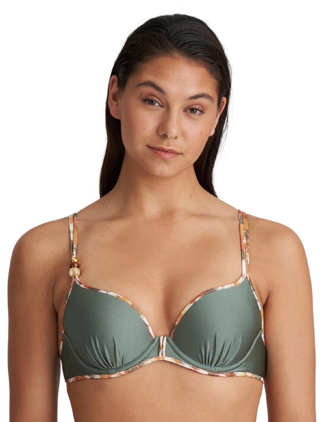 Enjoy a delicious look with this bikini bra from the Crete collection from Marie Jo. The bra uses padding to create a push-up affect which is delectably framed by the sweeping plunge neckline. The underwiring creates an added uplift as well as security within the piece. Slight moulding within the cups creates a rounded shape. Printed fabric runs along the trim of the piece to frame your d colletage. The adjustable straps can also be adapted into different fits, including a halterneck, so you can find the fit that is most flattering for you. A classic snap back clasp fastening is used for easy dressing.