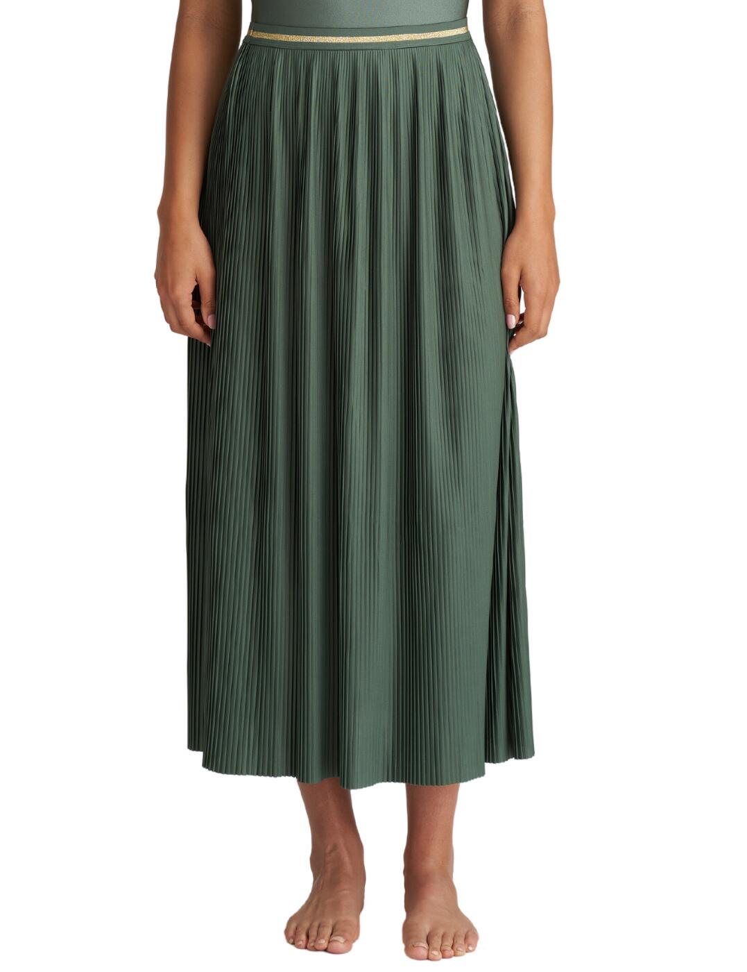 Meet the most elegant addition to your swimwear collection possible. This skirt is brought to you from the Crete collection by Marie Jo. The piece is made entirely from stretch material. Meaning not only is it comfortable along the waistline but that it is lightweight and soft on the skin, perfect for a floaty look in the sea breeze. The pleated style offers a twist to the classic. The longline, maxi skirt, design ensures the piece is boasting its elegance to all. The waistline is adorned with contrasting colours and a striping pattern to cinch the waist and promote the curves that are enhanced below.  Stretch material Comfortable waistline Lightweight Soft on the skin Classic pleated style Maxi skirt Contrasting, striped waistband Country of origin: Turkey Composition: 90% Polyester &pipe; 10% Elastane Listed in UK sizes   58935-103495-1352648 1005695 Maxi Skirt