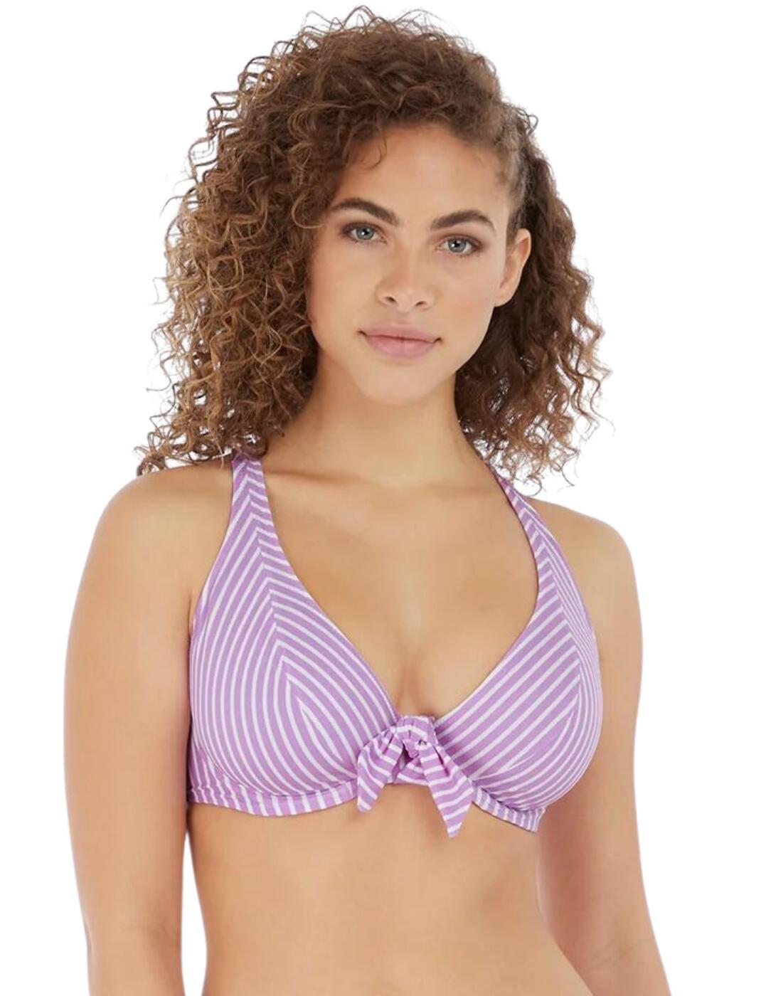 This halterneck bikini top from Freya's Beach Hut collection is chic and flirty, with high apex cups and a plunging neckline to show off your decolletage. The cups are underwired for support and non-padded to give your bust a natural, smooth shape. There is a self-tie design for the halterneck to allow you to adjust the fit to your body, and the rear clip fastening will stay secure all day long. There is a playful bunny knot detail in the centre for a feminine finishing touch.  Underwired Non-padded Plunge neckline Self-tie halterneck Clip fastening Bunny knot tie detail Country of origin: Sri Lanka Composition: 81% Polyamide &pipe; 19% Elastane Listed in UK sizes  58942-103503-1360379 6792 Halterneck Bikini Top