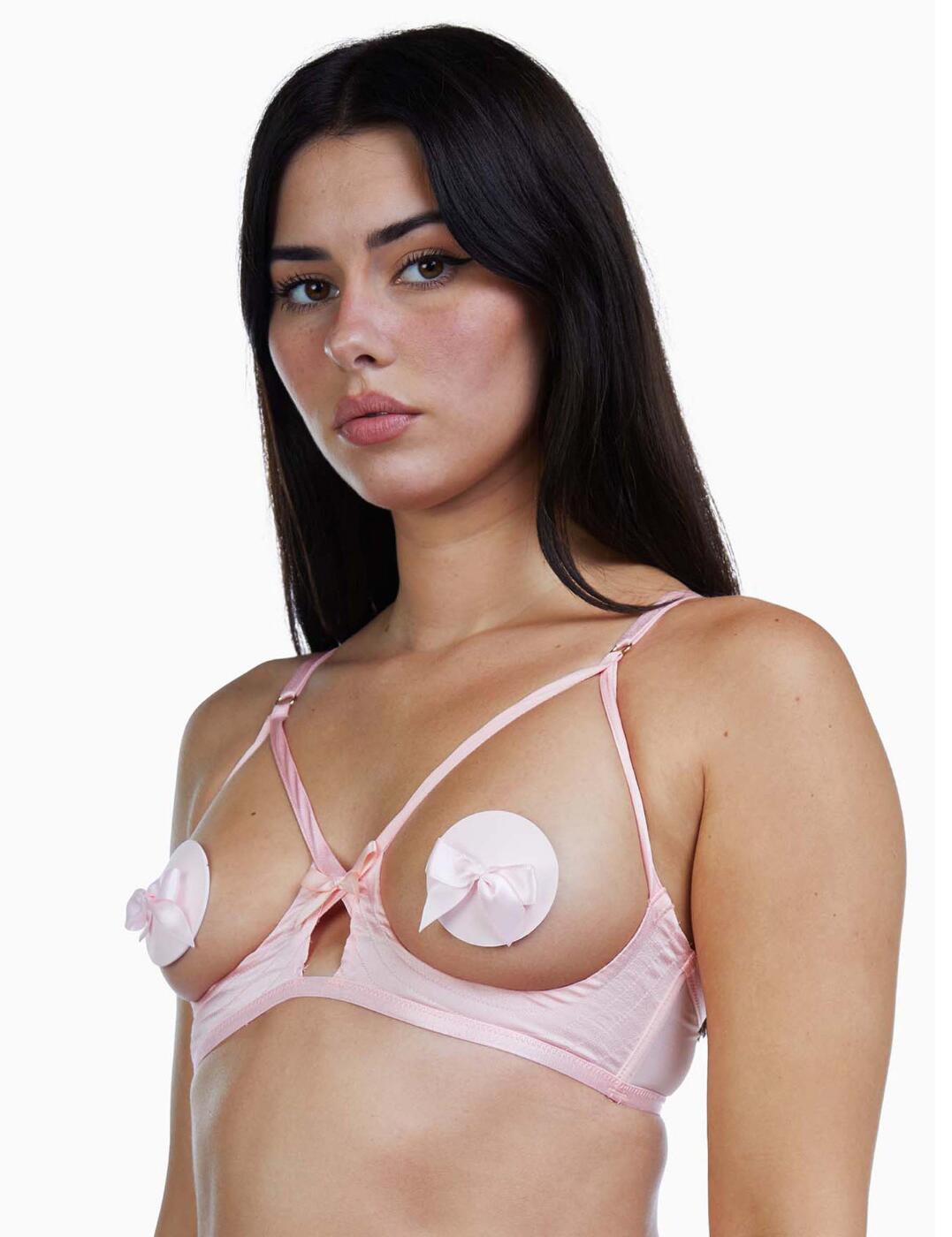 Create an irresistible look from this cupless bra from the Doris range by Playful Promises. The piece extends a satin material down the torso to promote a curvaceous style and ensure the attention is drawn toward the main attraction. Cut-out detailing in the centre, with an addition of a bow adds a sweet element. Before tapering to an over the bust strapping detailing which creates a bondage inspired look. The bra uses no underwiring for a perfectly natural look and utter comfort. Adjustable straps combined with a hook and eye closure creates a flawless optimised fit.  Satin material Cut-out details Bow adornment Over-bust strapping detailing No underwiring No cups Hook and eye closure Adjustable straps Country of origin: China Composition: Main 1: 100% Polyester Composition: Main 2: 100% Polyamide Composition: Main 3: 81% Polyamide 19% Elastane Listed in UK sizes  59025-103622-1358076 BP087 Open Cup Bra