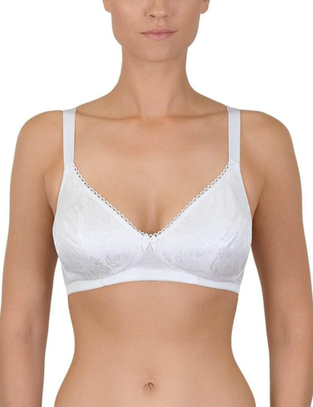 This padded bra from Naturana features seamless floral details over the cups and a chic bow embellishment for a flawlessly smooth silhouette with a feminine touch. The cups are non-wired with an elastic underband for a supportive, comfortable fit and the padding accentuates your bust for a confidence-boosting feel. Adjustable straps ensure that you can get the perfect fit while the rear hook and eye fastening keeps the bra secure and snug no matter what.  Non-wired Padded Adjustable straps Hook and eye fastening Floral cup details Seamless cups Elastic underband Bow embellishment Country of origin: Bangladesh Composition: 100% Polyester Listed in UK sizes  58981-103565-1353456 5223 Padded Bra