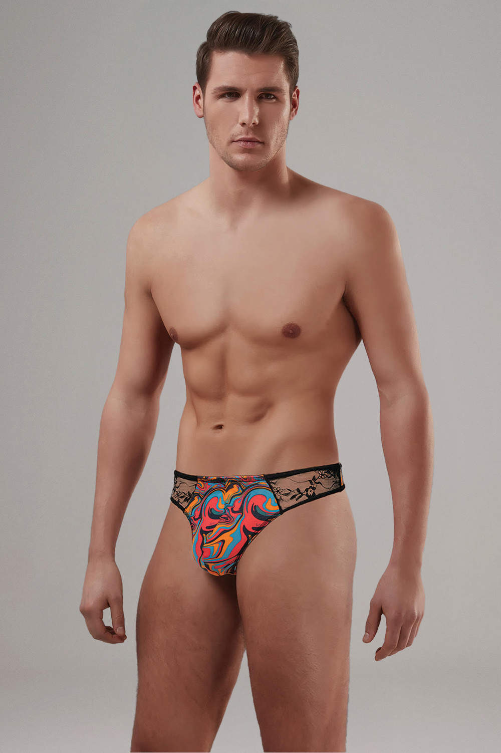 Shop Doreanse 1032 Thong men’s underwear string briefs – lined cotton pouch and see through lace. Sexy male slips in multicolour psychedelic swirls