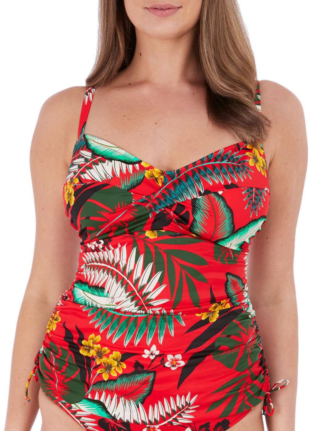 Fantasie's Vilamoura tankini top is feminine and chic, with a concealed underwire for support and lightly padded cups to provide a confidence-boosting lift to your bust and a smooth, rounded shape. Adjustable straps ensure that you can get the perfect fit and there is an inner hook and eye fastening for a secure hold that will last all day long. The sides have a tie feature to adjust the length, adding a flattering ruched design for a playful touch. Pair this tankini top with briefs from the Vilamoura range for a contemporary combination.  Concealed underwire Lightly padded Adjustable straps Inner hook and eye fastening Adjustable tie sides Flattering ruched design Country of origin: Tunisia Composition: 60% Nylon &pipe; 21% Polyamide &pipe; 19% Elastane Listed in UK sizes  59083-103686-1361475 6564 Tankini Top