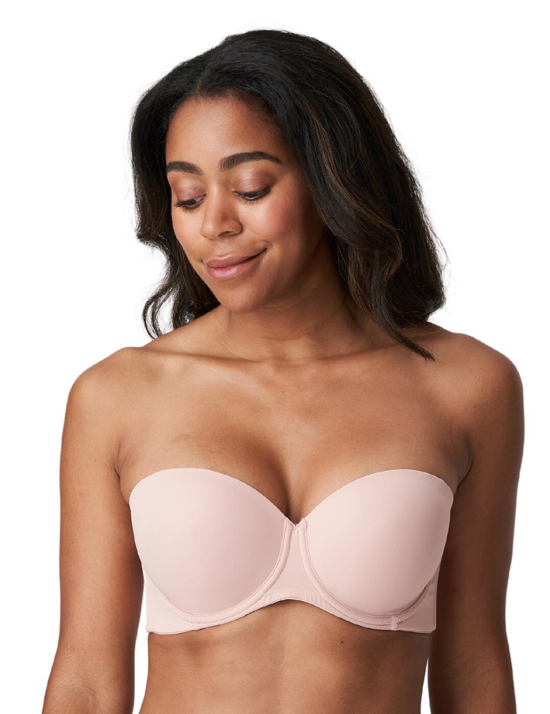 A perfectly adaptable bra, flawless for any occasion. This strapless bra comes to you from the Figuras collection by Prima Donna. The underwired cups provide a stunning lift that ensures a secure feeling. This is highlighted by the swooping neckline and bandeau cut. The padded cups create a rounded shape to the bust as well as further adding to the lift. A constructed back panel makes sure that the piece stays in place without creating an uncomfortable fit. The piece comes with detachable shoulder straps allowing you to alter the fit and style however you wish. These straps are fully adjustable for optimal personalisation of fit. A hook and eye fastening is used at the rear for a further personalised fit as well as a secure style.  Strapless bra Underwired cups Rounded bust Swooping neckline Padded cups Constructed back panel Detachable shoulder straps Fully adjustable straps Hook and eye fastening Country of origin: China/Longnan Composition: 45% Polyamide &pipe; 37% Polyester &pipe; 18% Elastane Listed in UK sizes  59089-103692-1354863 0263258 Strapless Padded Bra