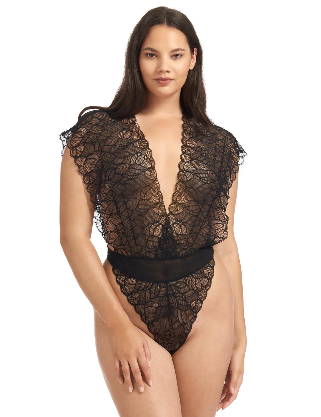 This soft body is a much-needed piece if you're looking to spice up your evening and have a playful night with your partner. The body is from the Emerson range by Bluebella. This body has a delicate all-over lace that lays softly against your skin. It has a deep plunging neckline and has no built-in cups meaning it's completely wireless. The lace goes over the shoulders and creates short sleeves as well as a deep v in the back. It has a high-cut leg style that flatters your silhouette whilst showcasing your gorgeous curves and rear with cheeky rear coverage.  Soft body All-over sheer lace Deep plunging neckline Wireless Short sleeves High-cut leg Cheeky rear coverage Country of origin: China Composition: Lace: 92% Polyamide &pipe; 8% Elastane Composition: Mesh: 94% Polyamide &pipe; 6% Elastane Composition: Gusset Lining: 100% Cotton Listed in UK sizes  35103-BK-8 35103  Body