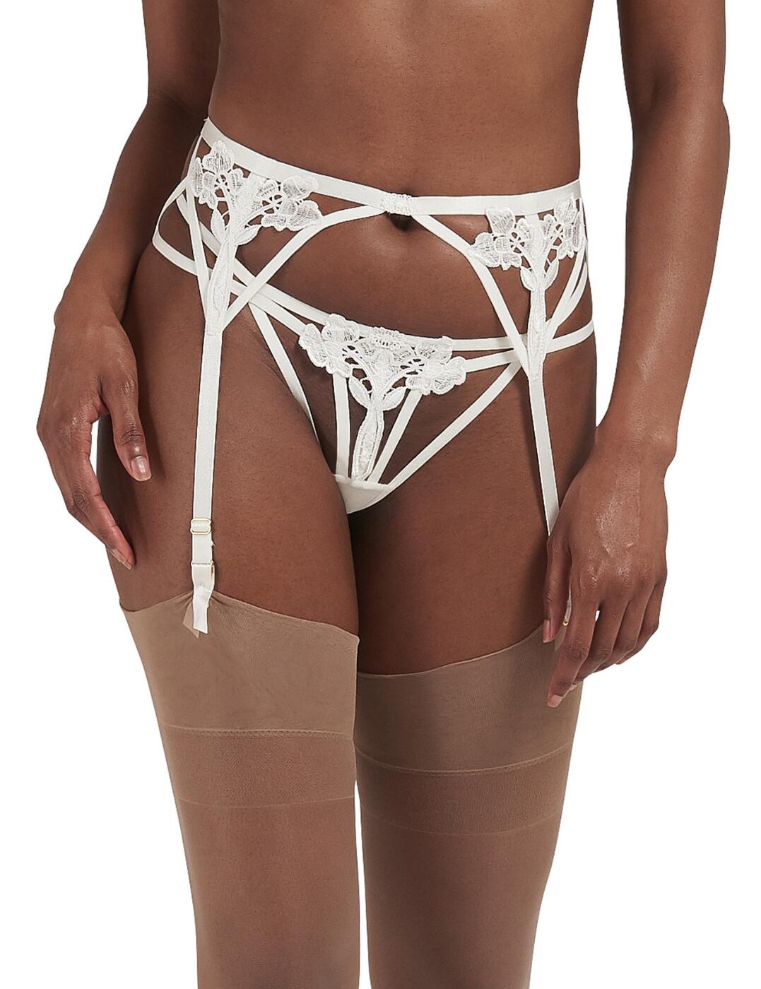 Complete the Nova lingerie look with this elegant suspender from Bluebella. From the Nova range, this suspender matches all the additional pieces that are also available with the strappy features at the side and rear as well as sheer guipure lace across the front that creates an alluring look. The waistband sits high-waisted and allows for a comfortable fit with a rear hook and eye closure and adjustable straps allowing you to create the perfect length for stockings.  Suspender Strappy detailing across sides and rear High-waisted Elegant guipure lace across the front Hook and eye closure at the rear Adjustable straps Stockings not included Country of origin: China Composition: 45% Polyamide &pipe; 34% Polyester &pipe; 21% Elastane &pipe; Excluding trims Listed in UK sizes  34803-IV-8 34803  Suspender Belt