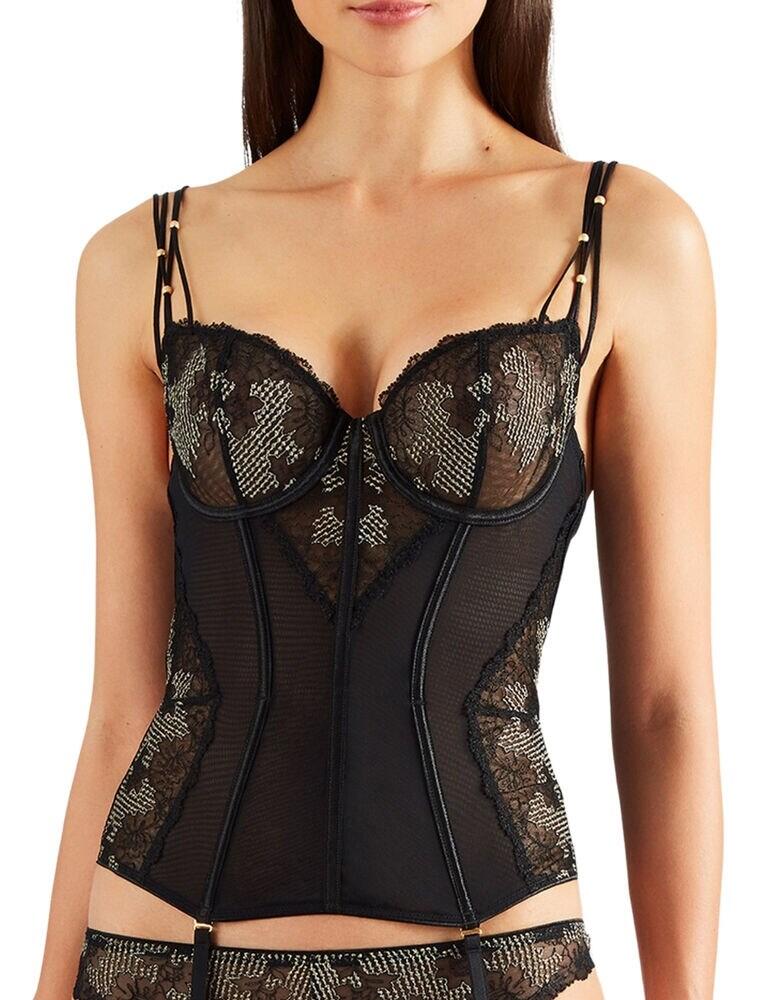Spice up your sexy lingerie drawer with this stunning basque from the La Belle Étoile range at Aubade. Guaranteed to turn heads, this piece features subtle French embroidery on the cups and side panels, giving your waist a brilliant appearance. Finished with beautiful spaghetti straps with gold beads for a distinctive look. This dreamy, enchanting piece is just the basque you have been looking for.  Seductive and feminine design French embroidery on cups and sides Spaghetti straps with gold beads Adjustable straps Hook and eye back Composition: 100% Polyester Listed in UK sizes  47988-87382-1165518 PH92  Basque
