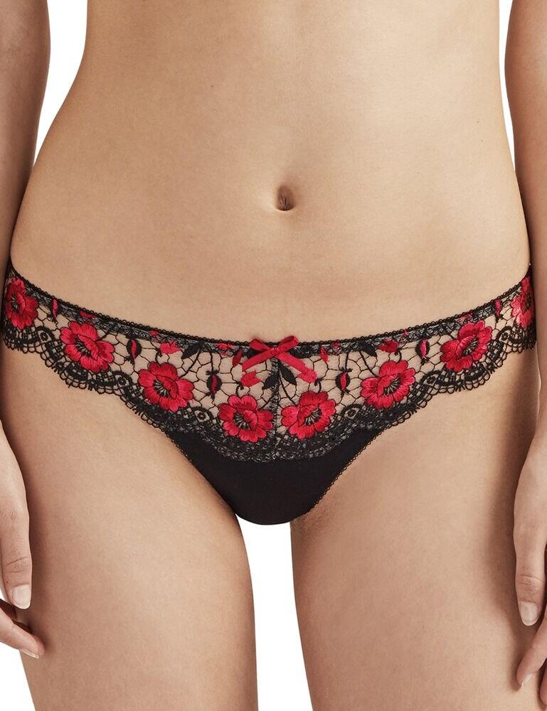 The simple and classic Tanga style brief has been given a stunningly embroidered flair for a truly flirty appearance with this tanga from the Fièvre Andalouse range at Aubade. The front is fully adorned with floral detailing on sheer fabric for a peek-a-boo of the skin. The high cut legs are crafted with scalloped edges for a pretty addition. The rear and crotch area are made from a clean-cut soft material for comfort in a thong style with a bright satin bow at the top.  Classic tanga style with sensual design Floral embroidery and satin bows Sheer front High cut legs with scalloped edge Composition: 83% Polyamide &pipe;17% Elastane Listed in UK sizes  48014-87427 QC26 Tanga Brief