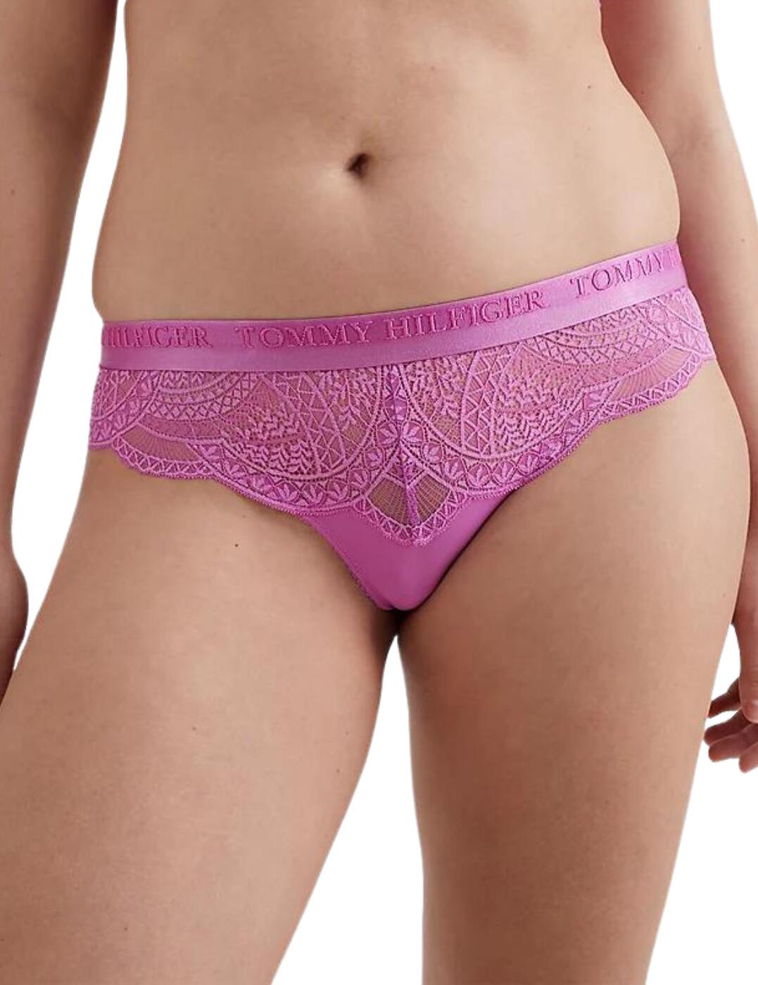 Tommy Hilifger elevates classic designs with these Brazilian briefs. Cut to a low-rise waist to showcase your beautiful natural curves with the minimal rear coverage creating a flirtatious flair. Crafted with an elegant floral lace for a deeply feminine finish that is complimented by the signature Tommy Hilfiger branding on the waistband that adds that designer edge. Complete the set with the available matching items from Tommy Hilfiger.