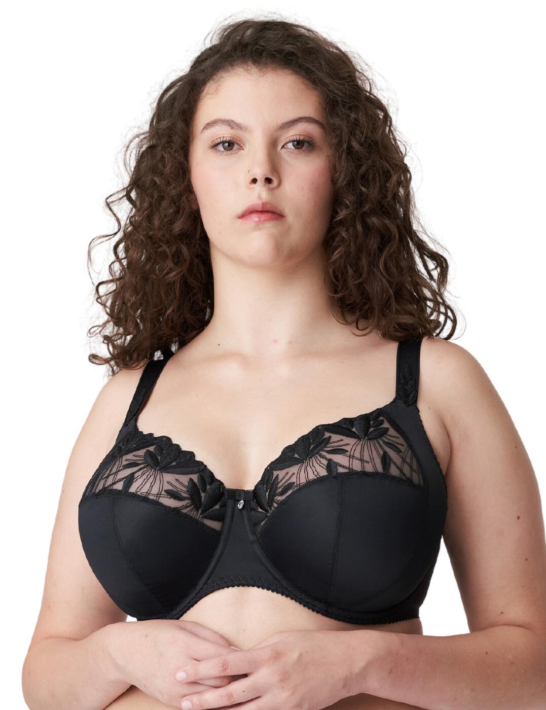 Prima Donna's Orlando range introduces this feminine and beautiful bra which is perfect for those with bigger busts. This full-cup bra is comfortable and supportive with the underwired, non-padded cups but still leaves you feeling amazing. It has adjustable, thick straps and a hook and eye closure for the perfect fit. This full-cup bra features shimmery embroidery across the upper cups and is adorned with a silver-tone charm in the centre to finish this gorgeous piece. Snap up the available matching items within Prima Donna's Orlando collection to complete this chic set.  Full cup bra Underwired for support Thick adjustable straps Rear hook and eye closure Non-padded cups Shimmery embroidery across upper cups Silver-tone charm detail on the centre bust Matching coordinates available Country of origin: Tunisia Composition: 84% Polyamide &pipe; 10% Elastane &pipe; 6% Polyester Listed in UK sizes  59367-104048-1358399 0163155 Full Cup Bra