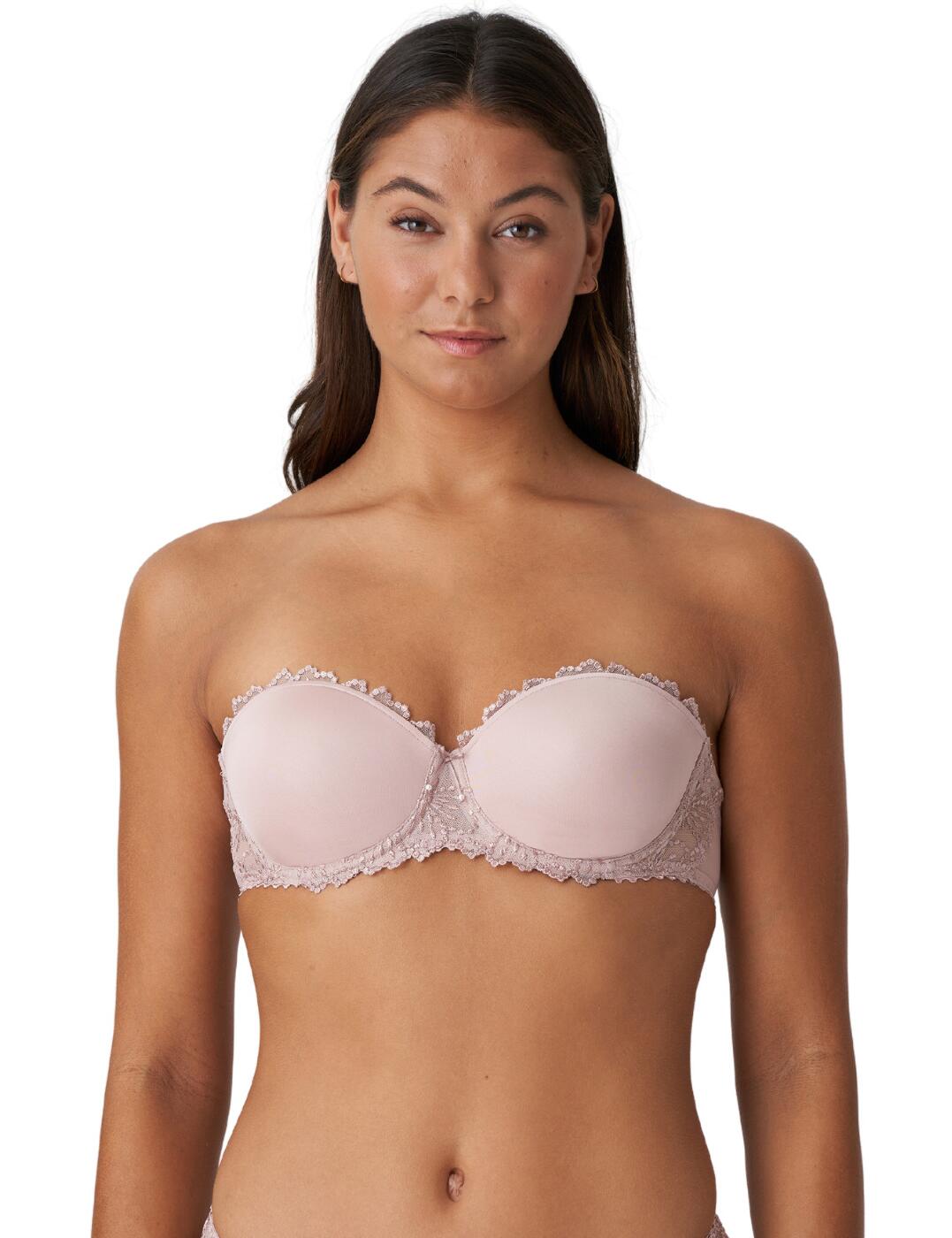 Upgrade your classics with this strapless padded bra from the Jane range by Marie Jo. This bra provides good coverage with padded cups that help enhance your cleavage whilst giving amazing support with the underwiring. The Jane range brings sophisticated details and this bra has beautiful features with embroidery running around the edges and straps, made complete with a mini bow in the centre. It has opaque smooth cups allowing for a seamless finish under clothes. Create your perfect fit with a hook and eye closure and adjustable straps that can also be detached for a strapless option allowing you to wear it with any top.  Strapless padded bra Good coverage Supportive underwire Embroidery detailing around the edges Mini bow in the centre Opaque smooth cups Hook and eye closure Adjustable detachable straps Composition: 53% Polyester &pipe; 35% Polyamide &pipe; 12% Elastane Listed in UK sizes  59410-104103-1360086 0101338  Strapless Padded Bra