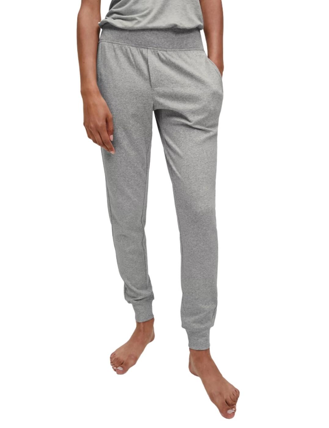 Ultra-softness and effortless style is what these joggers from the CK Form range at Calvin Klein will add to your loungewear collection. They have a medium-rise waist with a broad elastic waistband for a secure and flexible fit that will give you no restrictions. It is a straight leg with cuffed ankles for a non-limiting fit and pockets for an added feature.  Effortless and non-restricting design Medium-rise waist with wide elastic waistband Straight leg Cuffed ankles Front waist pockets Composition: 58% Cotton &pipe; 39% Modal &pipe; 3% Elastane Listed in UK sizes  48367-87964-1164041 QS6121E Joggers