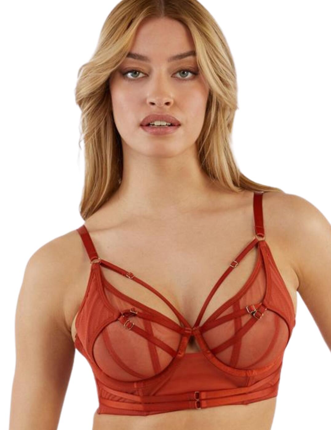 Catch everyone's eyes in this super sexy crossover wrap bra from the Eddie range by Playful Promises. This bra features a strappy design, longline style, mesh fabrics with fishnet detailing and satin materials on the harness design. It closes via a hook and eye closure and has adjustable straps allowing for an individual fit. The bra is also underwired to provide amazing support. Matching items available to create a fully coordinated look.  Crossover wrap bra Strappy harness design Longline style Mesh fabric Hook and eye closure and adjustable straps for an individual fit Underwired for a supportive fit Matching items available Country of Origin:- China Composition:- 94% Polyamide &pipe; 6% Elasthane Listed in UK sizes  55503-98958-1296095 PP3144 Longline Bra