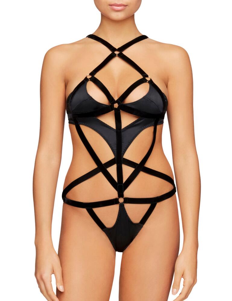 With this bodysuit from the Persephone range at Coco De Mer, you won't know where to focus your eyes! This piece, featuring a series of velvet straps that perfectly frame the body, will take anyone's breath away. You will keep your modesty with opaque silk sections over the areas needed. The design of this bodysuit is a luxurious bondage style that will give you a stunning figure and will make quite the entrance.  Show stopping and minimalistic design Bondage style, series of straps Modesty with opaque sections Moderate rear coverage Composition: 50% Silk &pipe; 40% Polyamide &pipe; 10% Elastane Listed in UK sizes  48467-88030-1172603 PER-022-01 Body