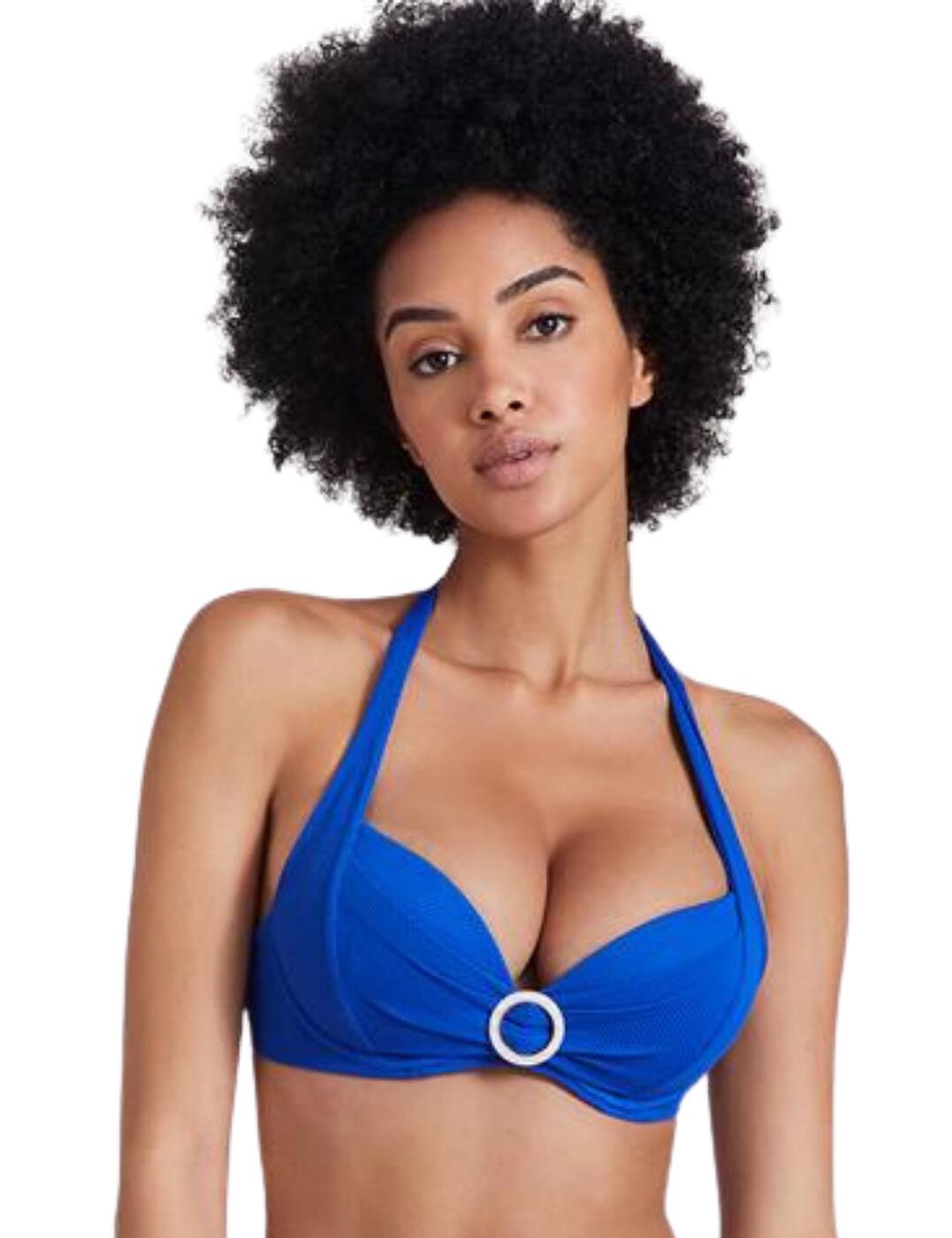 Update your swimwear collection this summer season with these sophisticated and luxurious pieces from the Summer Fizz range by Aubade. This moulded plunge bra is a new must-have with beautifully shaped cups that create a deep plunging neckline which showcases your cleavage with the extra support and uplifting from the moulded cups and built-in underwire. It hosts a retro vibe with rushing across the cups and a circle pendant in the centre which has a pearl effect. The whole bikini top is made from a stretch jacquard textured mesh to ensure a comfortable fit along with the multi-way adjustable straps which can be worn as a halterneck, normal and crossed back as well as the plastic clasp closure all allowing for an individual fit.  Moulded plunge bra Deep plunging neckline showcases cleavage Supportive underwire Retro vibe with rushing cups and centre pearl pendant Made from stretch jacquard textured mesh Multi-way adjustable straps allowing for a halterneck, cross-back or normal straps to be created Plastic clasp closure at the rear Country of origin: China Composition: Cup Lining: 100% Polyester Composition 2: 93% Polyamide &pipe; 7% Elastane Listed in UK sizes  56244-99893-1295842 IS08 Bikini Plunge Bra