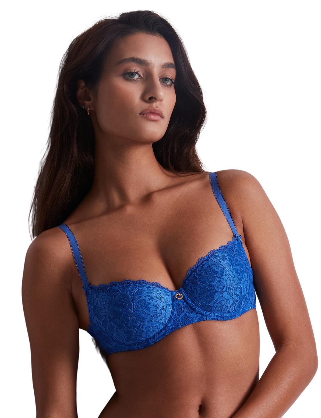 Fall in love all over again with the staple Rosessence collection with this gorgeous comfort bra from Aubade. This luxurious design features a flattering half-cup cut showcasing your decolletage. The underwired moulded cups provide a comfortable and supportive fit. This bra is covered in floral-patterned jacquard stretch lace, adding a feminine feel. The adjustable shoulder straps finish off at the back with v-shaped lace panels, which, together with the neckline, are decorated with pretty scalloped edges. Satin bows on the bottom of the straps and a charm in the centre front bring a final touch to this gorgeous design.  Half-cup design Floral jacquard lace throughout V-shape lace panels on the back Decorative bows and charm Scalloped edges on the decolletage and back Moulded cups Underwired Adjustable shoulder straps Hook and eye back closure Country of origin: Madagascar Composition cup lace: 72% Polyamide &pipe; 28% Elastane Composition lace side back: 82% Polyamide &pipe; 18% Elastane Composition middle lace: 85% Polyamide &pipe; 15% Elastane Composition cup/middle lining: 100% Polyester Composition lining back: 92% Polyamide &pipe; 8% Elastane Listed in UK sizes  59560-104270-1364851 HK04-6 Moulded Bra