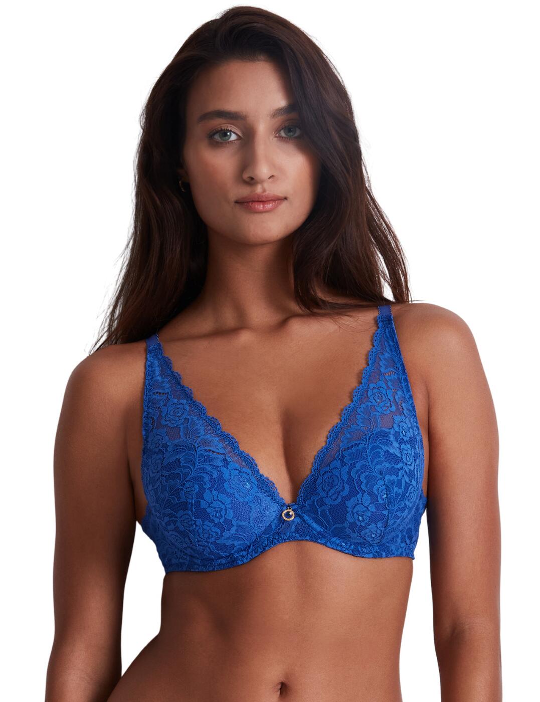 The Rosessence collection delights with its comfortable designs and feminine floral lace. This bra features a deep plunging neckline reinforced with triangle lace panels on top of the cups, creating an alluring V-shaped decolletage. Padded cups shape your bust beautifully and, together with the underwired quality, provide support and security. The adjustable shoulder straps finish off at the back with delicate stretch lace panels. Pretty scalloped edges and a metal charm in the centre front finish off this luxurious look.  Deep plunging neckline V-shaped decolletage Semi-sheer jacquard lace material Lace M-shaped panel on the back Scalloped edges Satin bows on the straps Metal charm in the centre front Padded Underwired Adjustable shoulder straps Hook and eye back closure Reinforced back (E-cup) Country of origin: Madagascar Composition lace: 82% Polyamide &pipe; 18% Elastane Composition lace middle front: 85% Polyamide &pipe; 15% Elastane Composition cup lining: 100% Polyester Composition front lining: 100% Polyamide Composition back lining: 92% Polyamide &pipe; 8% Elastane Listed in UK sizes  59578-104294-1365062 HK81-6 Plunge Padded Bra