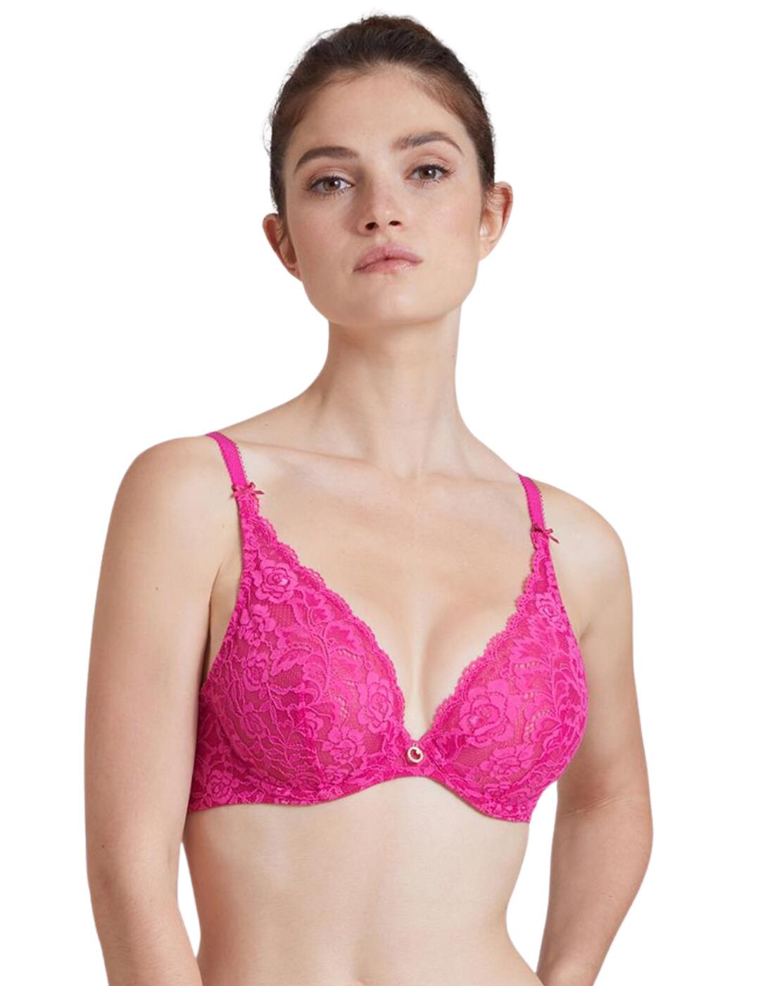 The Rossessence range by Aubade is one to not miss out on especially with this underwired triangle bra. Covered in all-over stretch jacquard pretty lace it is sure to create a gorgeous look along with the plunging neckline which features scallop edges and delicate bows at the straps. The bra provides amazing support and comfort with underwire, stretch lace back, stretchy straps that are adjustable and a hook and eye closure allowing for a perfect fit. Finished off with a gold charm in the centre that has a Swarovski crystal and the Aubade logo on it.  Triangle bra Underwired All-over lace Plunging neckline with scallop edges Delicate bows at the straps Stretch lace back for comfort Stretchy adjustable straps and a hook and eye closure Gold charm with Aubade logo and Swarovski crystals Country of origin: Madagascar Composition: Cup Lace: 82% Polyamide &pipe; 18% Elastane Composition 2: Lace Back: 82% Polyamide &pipe; 18% Elastane Composition 3: Middle Lace: 85% Polyamide &pipe; 15% Elastane Composition 4: Cup Lining: 100% Polyester Composition 5: Lining Back: 92% Polyamide &pipe; 8% Elastane Composition 6: Middle Lining: 100% Polyamide Listed in UK sizes  56290-99951-1296552 HK12-6 Plunge Bra