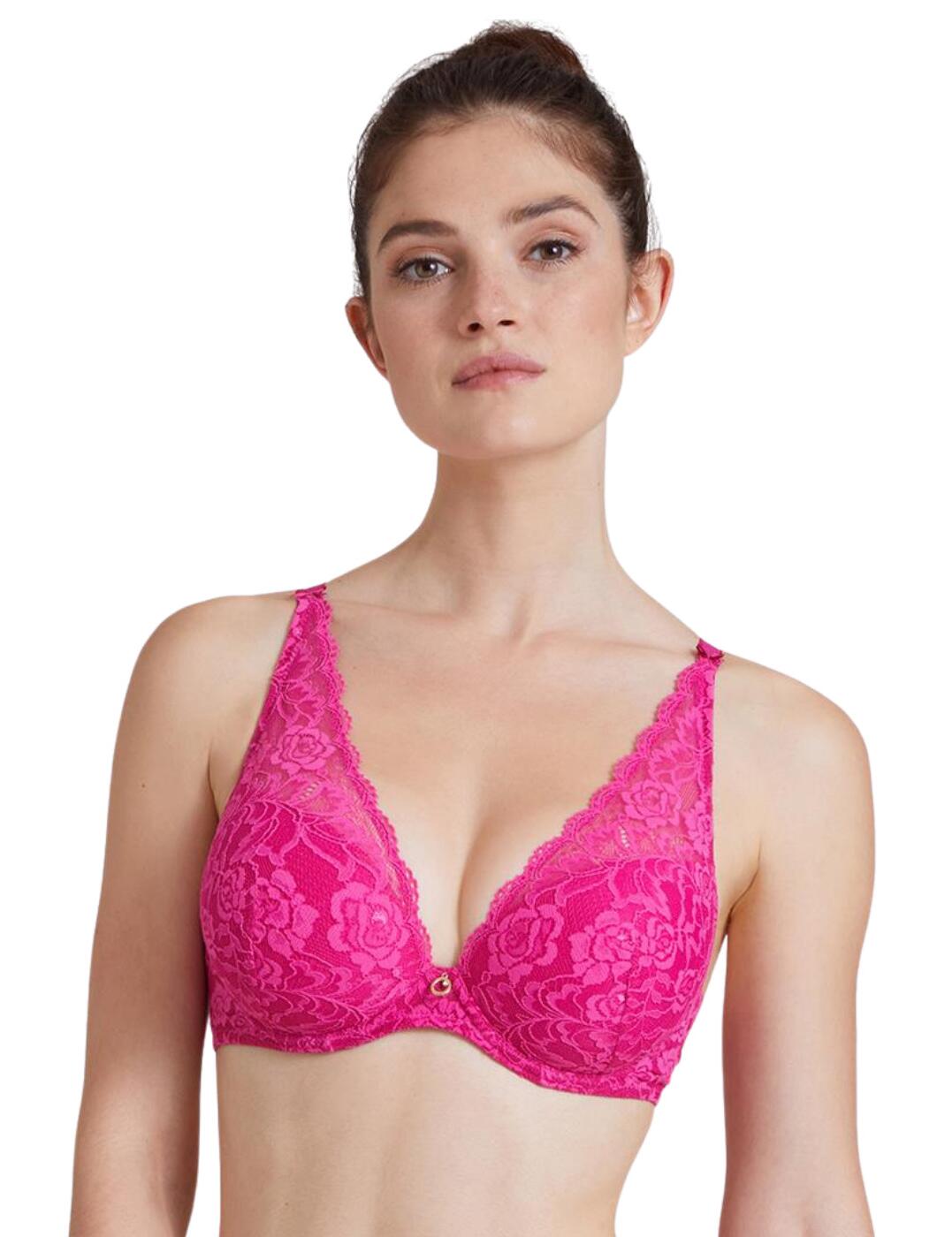 Add some luxury to your lingerie collection with the Rosessence range by Aubade. It introduces this shoulder plunge bra which ensures softness and incredible comfort. This elegant bra features all-over pretty lace that runs up to the collarbones creating an apex design. It has a plunging neckline from the triangle-shaped cups that showcases your cleavage. The bra has stretchy adjustable straps, a lace section at the back, a supportive underwire and a hook and eye closure. Made complete with a beautiful gold charm in the centre that features the Aubade logo and Swarovski crystals.  Plunge bra All over lace Apex design Stretchy adjustable straps Lace section at back for support Underwired Hook and eye closure Gold charm in the centre with Aubade logo and Swarovski crystals Country of origin: Madagascar Composition: Lace: 82% Polyamide &pipe; 18% Elastane Composition 2: Lace Middle Front: 85% Polyamide &pipe; 15% Elastane Composition 3: Cup Lining: 100% Polyester Composition 4: Front Lining: 100% Polyamide Composition 5: Lining Back: 92% Polyamide &pipe; 8% Elastane  Listed in UK sizes  56291-99952-1296567 HK81-6 Plunge Bra