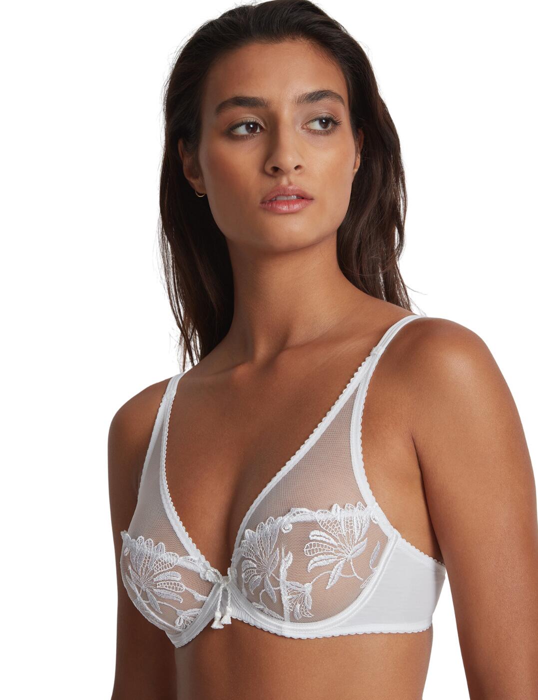 Be indulgent with this triangle bra from Aubade's Luxurious Lovessense line. This bra features sexy semi-sheer lace cups that are non-padded and underwired with a gorgeous plunging neckline providing the perfect supportive fit and ideal for wearing underneath any piece of clothing. Boasting a traditional hook and eye fastening and adjustable straps meaning this bra can be altered to your desired fit. Finishing off this flawless design with a bow detailing in the centre bust to draw attention to your amazing cleavage. To complete this set, snap up the matching available coordinates from Aubade Lovessense's range.  Triangle bra Underwired Non-padded Plunging neckline Sexy semi-sheer lace Classic hook and eye fastening Adjustable straps Scalloped edges Centre bow detail Matching coordinates available Country of origin: Tunisia Composition: Embroidery: 62% Polyester &pipe; 38% Polyamide Composition: Lining: 100% Polyamide Composition: Knit: 82% Polyamide &pipe; 18% Elastane Composition: Tulle: 100% Polyamide Listed in UK sizes  59603-104335-1365978 RMF12 Plunge Bra