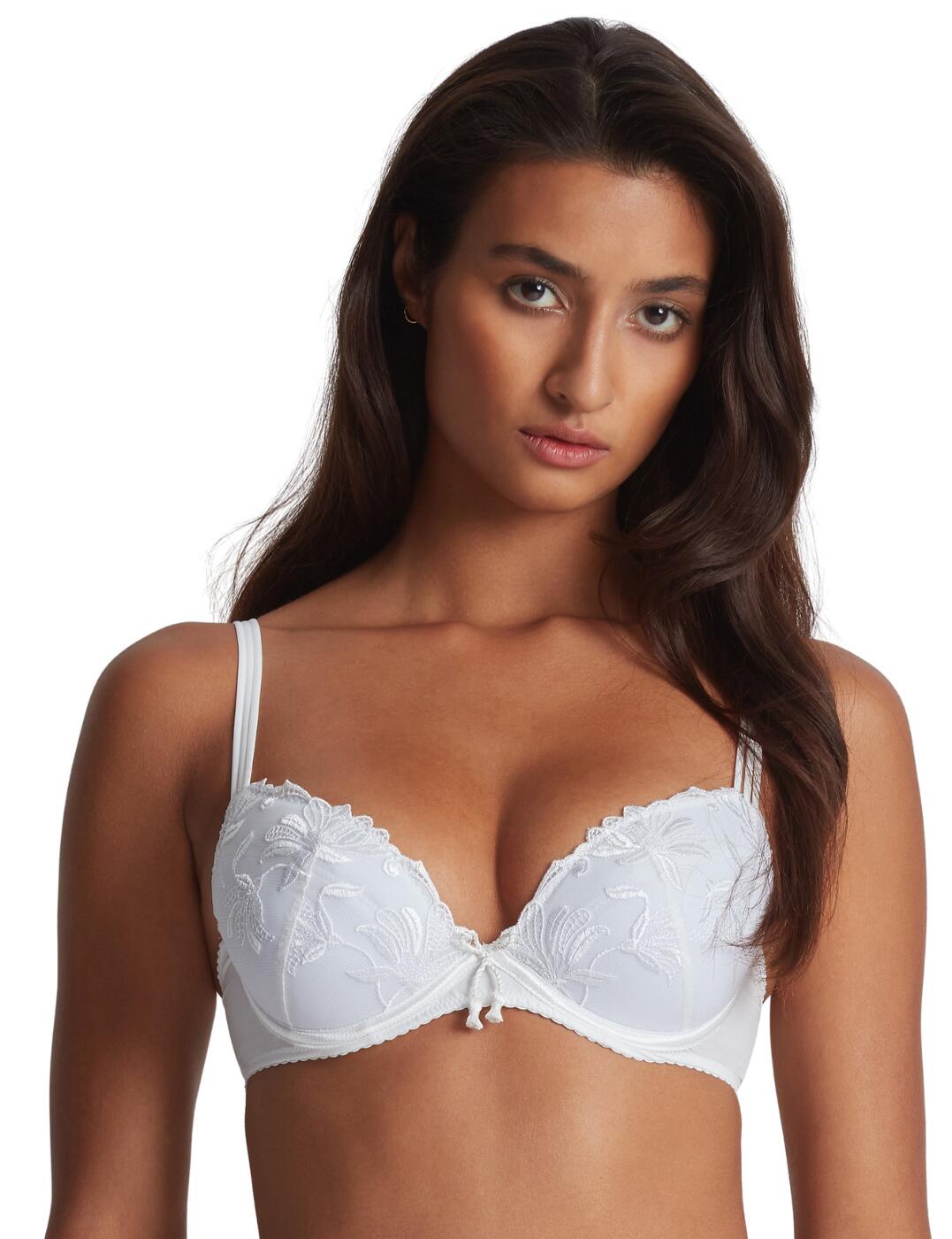 Aubade's Lovessense line introduces this elegant and sophisticated plunge bra. The simple and beautiful design boasts padded and underwired cups for outstanding support and uplift to your curves. This piece has a classic hook and eye and an adjustable strap detailing so you can tailor it to your natural silhouette. Adorned with delicate lace on the cups and a bow charm on the centre bust for that feminine finishing touch. To complete this stylish set, take advantage of the matching available coordinates from Aubade Lovessense's range.  Plunge bra Elegant lace details Underwired Padded Removable padding Hook and eye fastening Adjustable straps Matching coordinates available Country of origin: Tunisia Compostion: Embroidery: 50% Polyester &pipe; 35% Polyamide &pipe; 15% Elastane Compostion: Lining: 100% Polyamide Compostion: Bottom Lining: 100% Cotton Compostion: Top Lining: 100% Polyester Compostion: Knit: 82% Polyamide &pipe; 18% Elastane Listed in UK sizes  59604-104336-1366066 RMN18 Plunge Bra