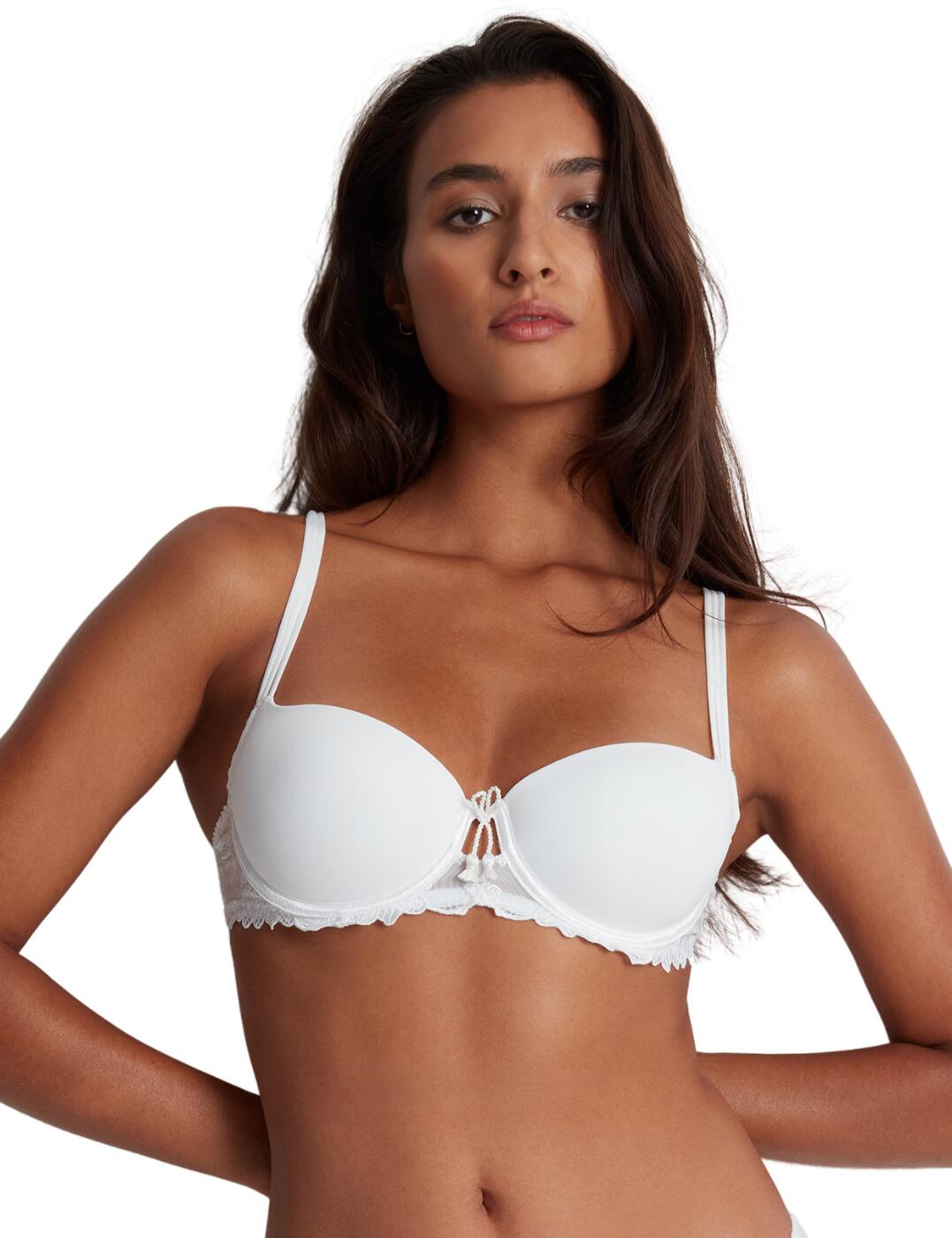 Bring luxury to your every day with this stunning moulded half-cup bra from Aubade's gorgeous Lovessense line perfect to add to your lingerie collection. This bra has underwired, moulded cups for a refined shape to your bust and support. Be comfortable with this half-cup bra featuring a classic hook and eye fastening and adjustable shoulder strap detailing that can be customised to perfectly fit your figure. Delicate scalloped lace on the underband and a flirtatious bow detail on the centre bust finishes off this gorgeous piece. To complete this beautiful set, snap up the matching available coordinates from Aubade's Lovessense range.  Moulded half-cup bra Underwired Adjustable straps Classic hook and eye fastening Scalloped edges Lace underband Simple and comfortable design Matching coordinates available Country of origin: Tunisia Composition: Embroidery: 52% Polyester &pipe; 34% Polyamide &pipe; 14% Elastane Composition: Lining: 100% Polyamide Composition: Bottom Lining: 100% Cotton Composition: Top Lining: 100% Polyester Compostion: Knit: 82% Polyamide &pipe; 18% Elastane Listed in UK sizes  59605-104338-1366115 RMN04 Half Cup Bra