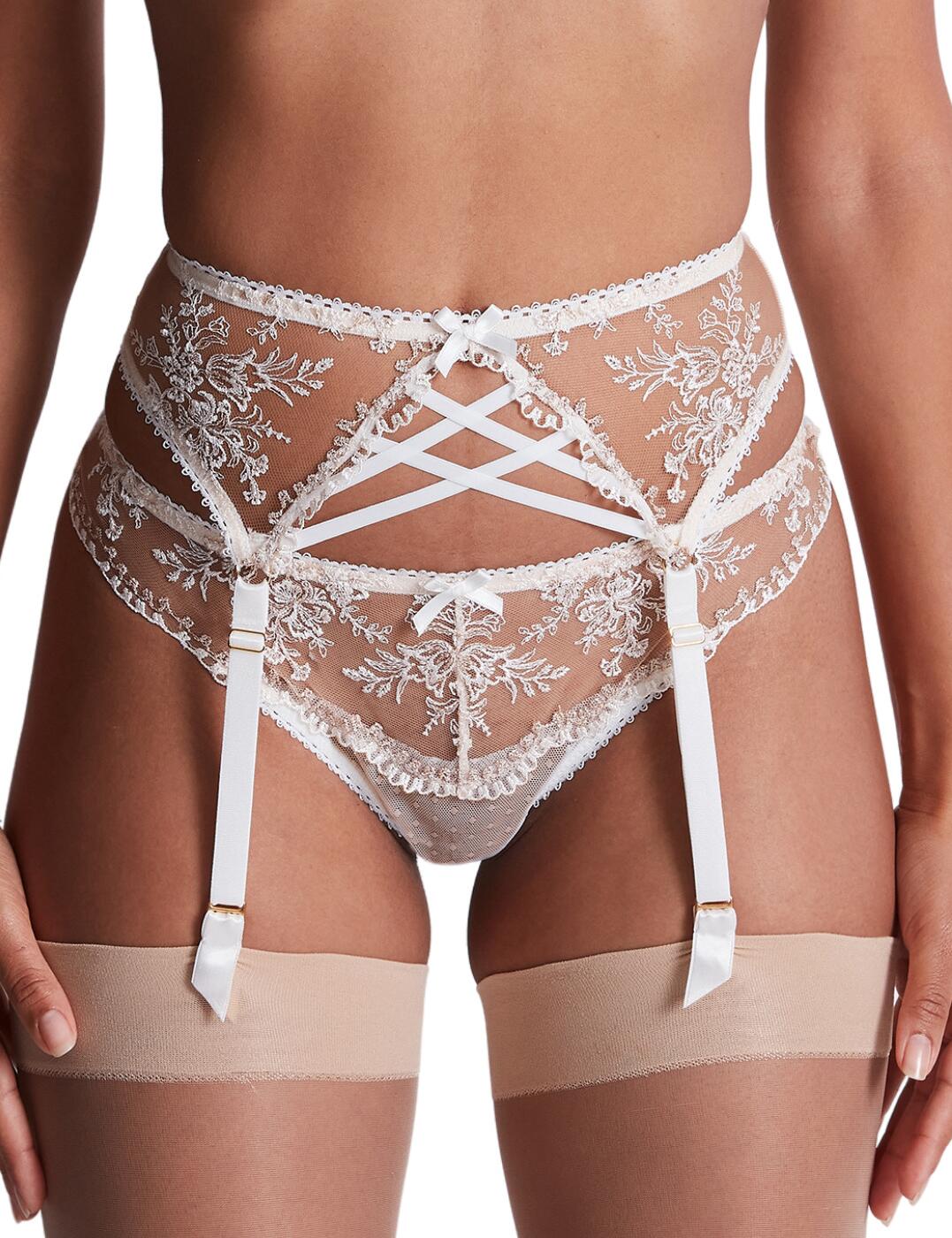 Aubade created a truly unforgettable line with the Tresor Infini collection. The sheer materials are decorated with stunning embroidery and metallic thread, adorning the front of this suspender belt. The back is contrasted by a mesh fabric with a dotted pattern. This piece features 4 adjustable suspender straps and closes with a hook and eye fastening at the back, so it is easy to adapt to your best fit. To finish off this gorgeous look, the suspender belt has a strappy design in the centre front with a satin bow above it. Complement with other items from the Tresor Infini range for a fully coordinated lingerie set.  Sheer embroidered material on the front Mesh with a dotted pattern on the back Strapping detail in the centre front Scalloped edges 4 adjustable garter straps Hook and eye back closure Country of origin: Tunisia Composition front embroidery: 73% Polyester &pipe; 24% Polyamide &pipe; 3% metallic thread Composition tulle back: 78% Polyamide &pipe; 22% Elastane Listed in UK sizes  59606-104339-1366186 ID50 Suspender Belt