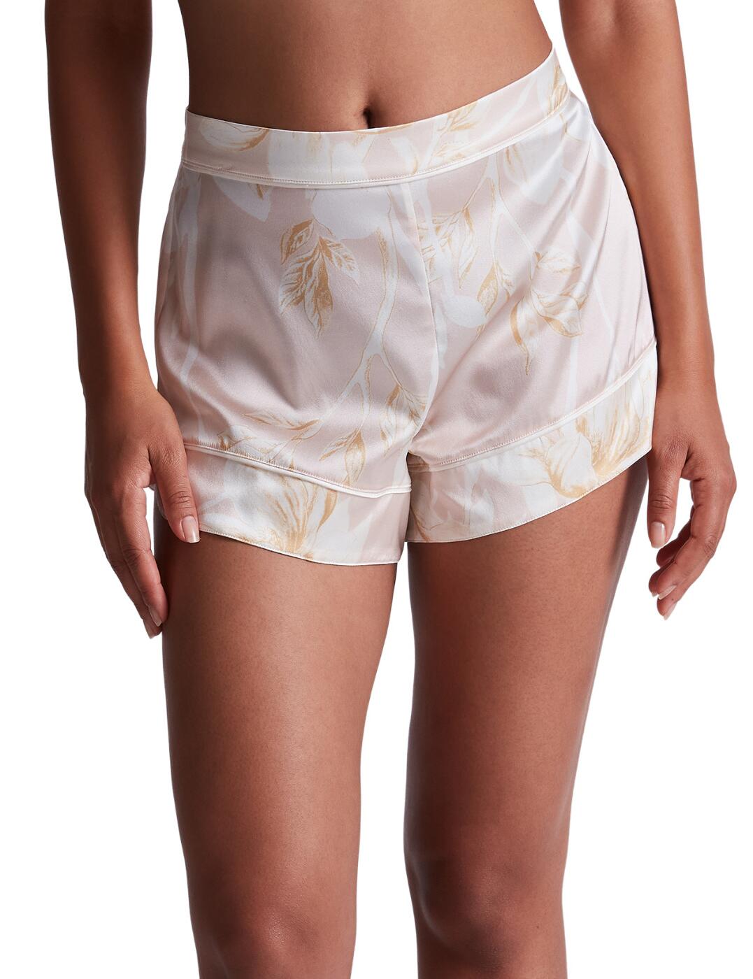 Lounge in elegance with Aubade's Silk by Night collection. Featuring these luxurious silk boxer shorts, which are perfect for those warmer nights. Crafted in a breathable premium material to keep you comfortable all night; including a high waist and full rear coverage design for a flattering fit to your curves. To ensure it feels snug, the back of the waistband is elastic to keep it in the optimal position all night long. Pair them with other available items in the Silk by Night series to complete this stunning set.  Silk boxer shorts High waisted Full rear coverage Comfortable elastic back waistband Cuffed at the leg Matching coordinates available Country of origin: China Composition: 92% Silk &pipe; 8% Elastane Listed in UK size  59617-104352-1366603 RT61 Shorts