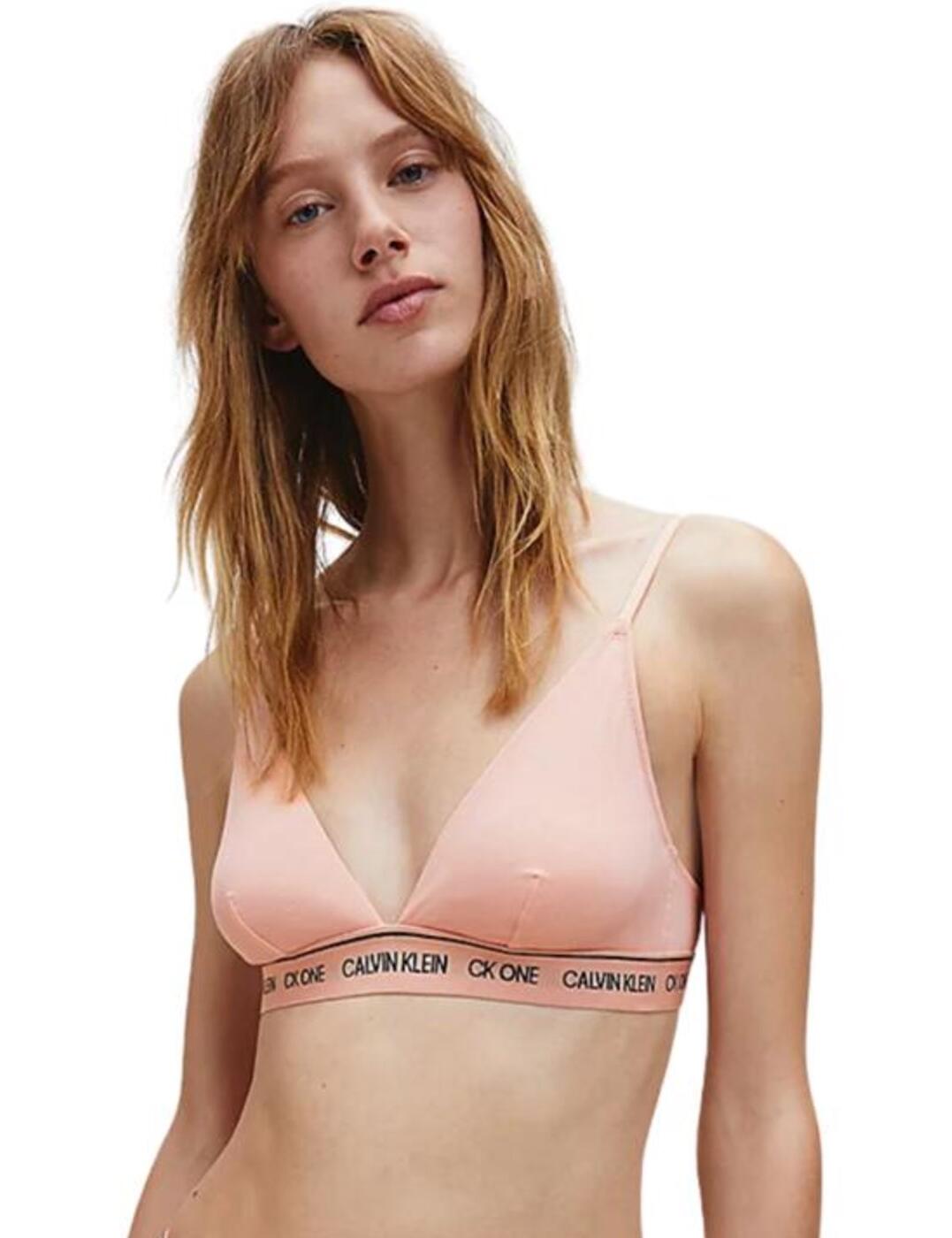 The CK One Recycled collection uses Clavin Kleins recognisable style with innovative technology which transforms plastic from the oceans into a sustainable but super soft fabric so you can feel extra good wearing any piece. This classic triangle bra shape has soft non-padded cups and is non-wired offering the ultimate comfort for everyday wear. The branded Clavin Klein underband makes a statement and offers stretch for support. Finished with a classic hook and eye fastening and adjustable straps for a unique fit. Complete your look with matching items available from the CK One Recycled range from Calvin Klein.  Classic triangle shape Iconic branded Calvin Klein underband Non-padded and non-wired for comfort Adjustable straps for individual fit Soft stretch sustainable fabric Composition: 89% Recycled Polyester &pipe; 11% Elastane Listed in UK sizes  48596-88237-1186694 QF6316E Bralette