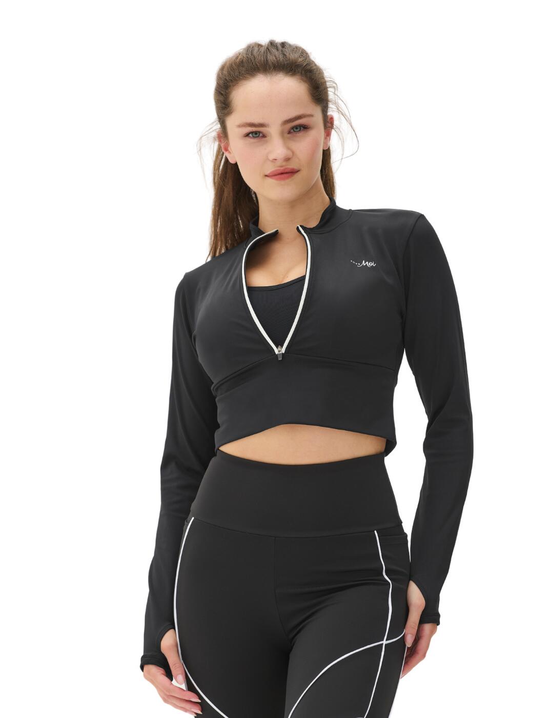 The Energy Pulse range is renowned for its on-trend gym wear. This long sleeve crop top by Pour Moi is no exception. Perfect for morning jogs season after season or keeping warm during winter sessions whilst still being unrestrictive. The close fit provides a flattering appearance and will not restrict movement. Sweat wicking fabric keeps you feeling fresh no matter how heated your workout gets. Thumb holes keep hands free. Perfect for layering over a tank or your favourite sports bra. Features a handy half zip and Pour Moi branding on the chest.  Sweat wicking fabric Thumb holes Pour Moi branding Country of origin: China Composition: 78% Polyester &pipe; 22 Elastane Listed in UK sizes  51775-93372-1248935 97134 Crop Top