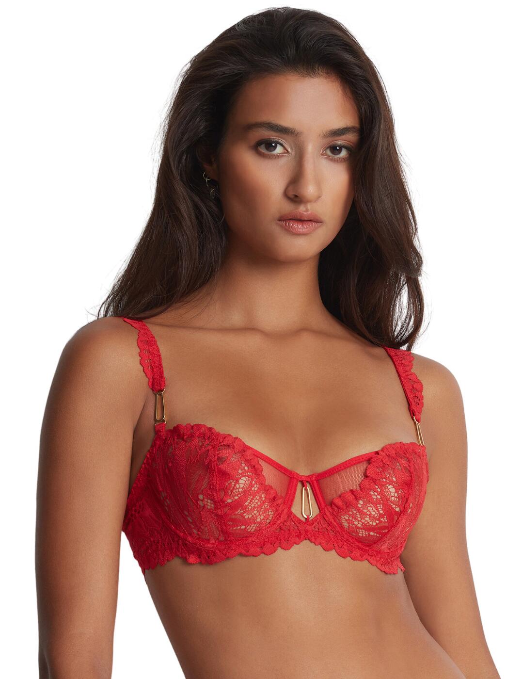 Elevate your bust with this half-cup bra from the luxurious Aubade. A part of the Flowermania range, the bra is crafted from recycled lace in a gorgeous eye-catching floral pattern with sexy tulle sections. The half-cups flatter your bust incredibly with a lifting effect and showcase your cleavage by creating a rounded shape. It has non-padded cups allowing for a natural feel and guarantees great support with the built-in underwire. The lace runs along the adjustable straps adding a flirty feel as well as a cut-out and gold charm at the centre which matches the charm on the straps. It closes via a hook and eye closure at the rear.  Half-cup bra All-over recycled lace Floral pattern Uplifting effect Non-padded cups Supportive underwire Eye-catching cut-out in the centre with gold charm Flirty lace along adjustable straps Hook and eye closure Matching lingerie is also available Country of origin: Tunisia Composition: Cup lace: 100% Polyester Composition: Lace front back: 86% Polyamide &pipe; 14% Elastane Composition: Lining: 100% Polyester Listed in UK sizes  59668-104413-1367757 LAF14 Half Cup Bra