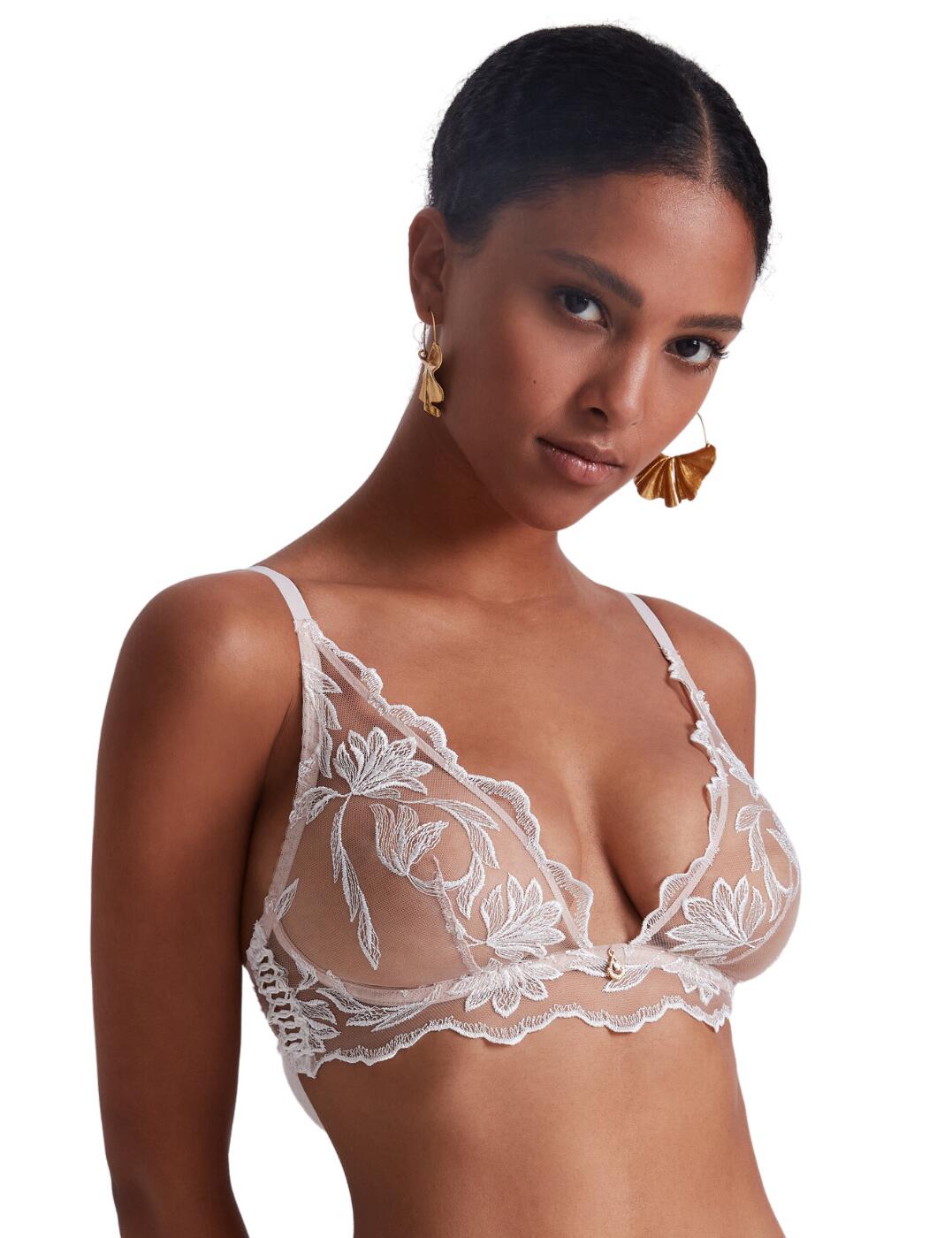 Be bold this season with this stylish bralette from the luxurious Season of Love line by Aubade. Featuring non-padded cups and wireless for utmost support and comfort. This piece features a plunging neckline which will make your bra invisible underneath any piece of clothing. To provide the best secure fit and flatter all your curves, this bralette has a traditional hook and eye fastening and adjustable straps. This design has sexy sheer mesh material decorated with floral lace and beautiful scalloped edges. A gorgeous pendant detail finishes off this flirty and sophisticated piece. To complete this set, snap up the matching available coordinates from the Aubade Season of Love's range.  Stylish bralette Non-padded Wireless Classic hook and eye fastening Scalloped edges Adjustable straps Sheer mesh material Floral lace details Plunging neckline Pendant detail in the centre bust Matching coordinates available Country of origin: Tunisia Composition side embroidery: 100% Polyester Composition front embroidery: 78% Polyester &pipe; 22% Polyamide Composition back embroidery: 51% Polyester &pipe; 40% Polyamide &pipe; 9% Elastane Listed in UK sizes  59678-104423-1367107 LC10B Bralette