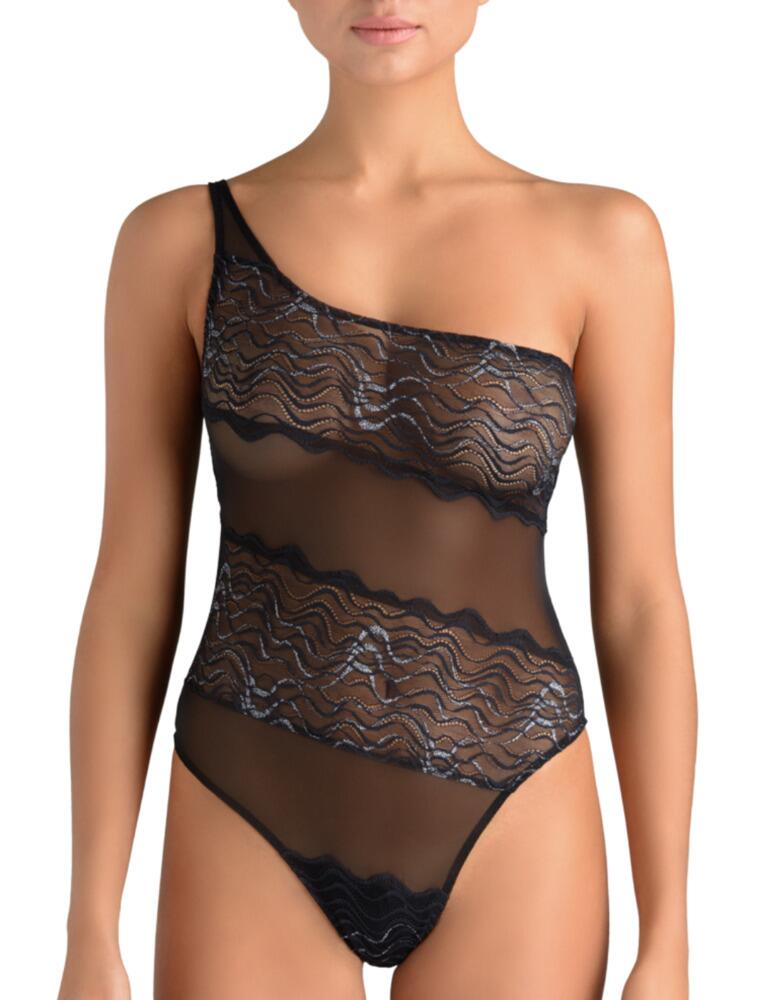 This beautifully sensational bodysuit from the Katharine range at Muse by Coco De Mer is an absolute standout piece. Designed from a semi-sheer fabric, the wavy pattern has been cleverly placed over intimate zones for a flirty appearance on this figure hugging silhouette. The crotch area has also been lined or added modesty. The wavy pattern shines on this piece with glittery elements. One strap gives this bodysuit a unique flair, whilst been adjustable for extra support. The back of this suit is a simple and clean look with a cut-out centre and thong style rear.  Eye-catching and sensual design Semi-sheer fabric with wavy pattern Figure hugging Lined crotch area for modesty One strap, adjustable Clip fastening at rear Cut-out centre back Thong style rear Composition: 95% Polyamide &pipe; 5% Elastane Listed in UK sizes  48106-87540-1161543 KAT-022-01 Body