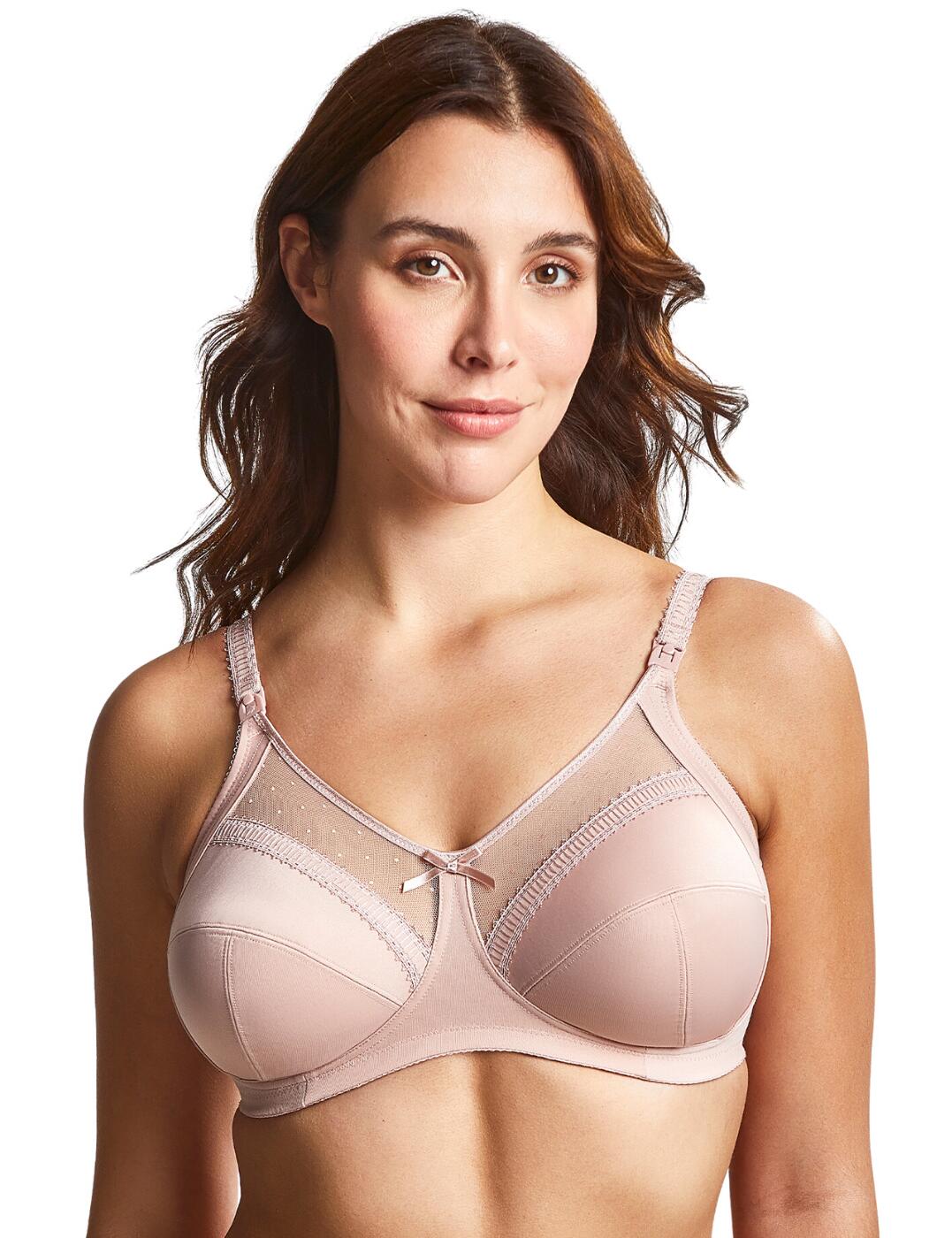 A maternity spin on the classic Charlotte bra with a Charlotte Nursing range by Royce is exactly what you need for that special time. With a non-wired and non-padded style, this piece is sure to be incredibly comfortable, while the full-coverage cups, side slings and supportive design will give you a secure fit. The adjustable shoulder straps have clip openings on the front for easy access when nursing, with side straps keeping your bra in place during that time. Finished off with sheer panels on top of the cups, this bra is comfortable and feminine all at once.  Nursing clip openings on the straps Full-cup design Side slings Sheer mesh panels on top of the cups Decorative bow in the centre Non-padded Non-wired Hook and eye back closure Adjustable shoulder straps Country of origin: China Composition: 60% Polyamide &pipe; 33% Cotton &pipe; 7% Elastane Listed in UK sizes  59685-104430-1367347 822 Maternity Bra