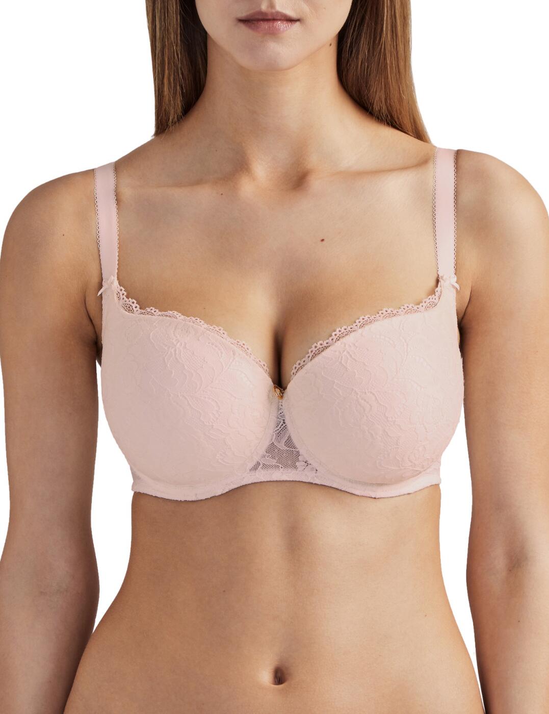 The Rosessence collection from Aubade offers timeless designs with a romantic French style. This moulded half-cup bra has a complete rose motif lace design creating an ultra-feminine style perfect for everyday wear. The iconic half-cup shape offers moderate coverage creating an emphasised cleavage and combined with the transparent lace detail for an added seductive style. Underwiring offers support whilst the adjustable straps allow for a unique fit. Perfect your look with matching items available from the Rosessence range by Aubade.  Complete floral lace design Classic half-cup shape Moulded cups and underwired for support Adjustable straps for individual fit Composition: 72% Polyamide &pipe; 28% Elastane Listed in UK sizes  48644-88305-1169745 HK04 moulded half cup Bra
