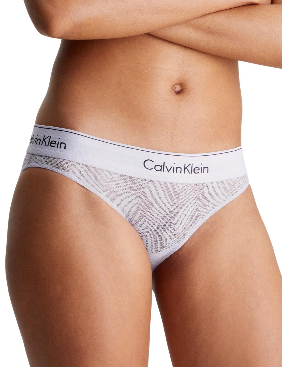 Elevate your lingerie game with the Calvin Klein beautiful brief. Designed for fashion-forward women, this low-rise, moderately covered brief combines sultry comfort with a touch of allure, thanks to its sheer, patterned lace design. Featuring the iconic Calvin Klein waistband for added sophistication, and available with matching pieces for a coordinated look, the beautiful brief is a must-have for those seeking stylish and designer undergarments. Embrace elegance and confidence with Calvin Klein.