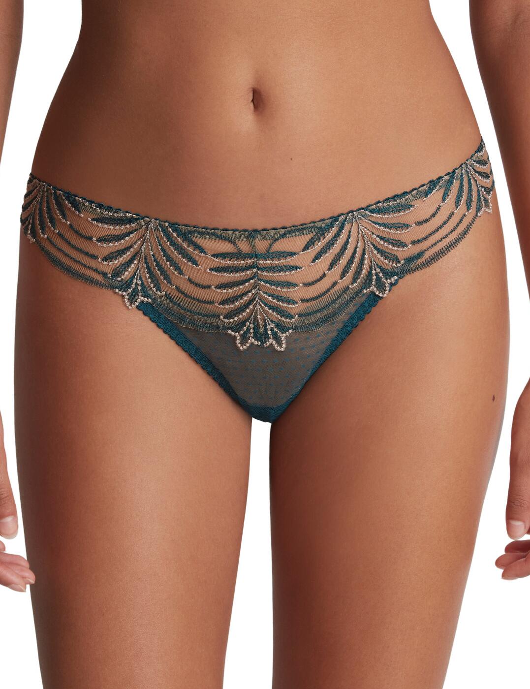 Introducing this timeless and sexy piece from Aubade's new range Hypnolove. Feel stylish and fashion-forward with this tanga brief. Featuring minimal rear coverage and a low-rise waist for a seductive touch. This flattering fit design has a beautiful embroidered pattern along with scalloped edges. This unique piece has a strappy detail on the rear for a flirty and alluring finish. To complete this set, snap up any of the matching coordinates available from Aubade's luxurious Hypnolove range.  Tanga brief Minimal rear coverage Low-rise waist Sheer embroidered details Scalloped edges Flattering fit Unique strappy design in the rear Matching coordinates available Country of origin: Tunisia Composition embroidery: 63% Polyester &pipe; 24% Polyamide &pipe; 13% Elastane Composition gusset: 100% Cotton Composition tulle: 77% Polyamide &pipe; 23% Elastane Listed in UK sizes  59691-104436-1367216 LD26 Tanga Brief