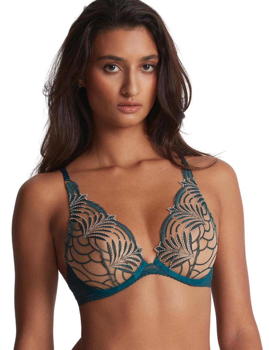 Introducing this luxurious triangle bra to Aubade's amazing Hypnolovce collection is a must-have for its comfortable and chic design. Features a gorgeous plunging neckline, non-padded cups and underwiring giving you perfect support and a flattering fit. This piece has a classic hook and eye fastening and adjustable straps to allow you to tailor it to your individual curves. For a flawless finish, this design has an amazingly crafted embroidered cup with delicate scalloped edges and a dotted pattern on the mesh for a sophisticated and elegant touch to this timeless piece. Complete this set and snap up any of the matching available coordinates from Aubade's luxury Hypnolove range.  Triangle bra Plunging neckline Scalloped edges Beautiful embroidery Classic hook and eye fastening Underwired Non-padded Tulle dot mesh underband Adjustable straps Matching coordinates available Country of origin: Tunisia Composition cup embroidery: 77% Polyester &pipe; 23% Polyamide Composition lining: 100% Polyester Composition tulle: 77% Polyamide &pipe; 23% Elastane Listed in UK sizes  59696-104441-1367398 LDF12 Plunge Bra